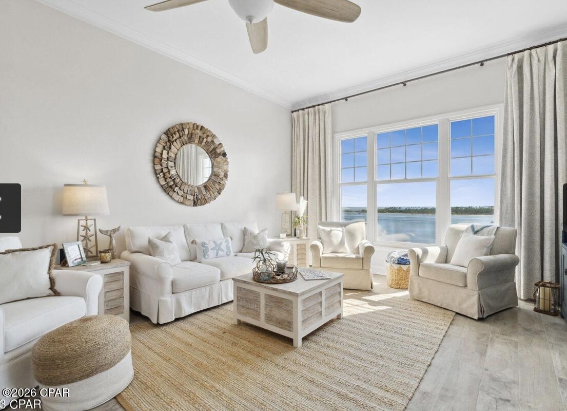 Rare 8th-floor opportunity at Reflections in the Bay Point community! This tastefully furnished condo offers unobstructed views of St. Andrews Bay. Enjoy your morning coffee or unwind at the end of the day from your private balcony while taking in the ever changing scenery. Watch dolphins and manatees play, boats cruise through the channel, and enjoy panoramic views of St. Andrews State Park and Shell Island.

Inside, natural light fills the open living space, highlighting the coastal décor and luxury vinyl plank flooring. The kitchen features stainless steel appliances and flows seamlessly into the dining and living areas, making it easy to entertain while enjoying the view. The primary suite offers a walk-in shower, dual-sink vanity, and a relaxing retreat after a day on the water.

Being sold fully furnished, this condo is ready to enjoy from day one. Whether you're looking for a full-time residence, a vacation getaway, or an investment opportunity, short-term rentals are allowed, offering excellent income potential and flexibility.

Reflections offers outstanding amenities, including a lagoon-style pool, hot tubs, community grilling areas, fire pits, an owner's lounge, and beautifully maintained grounds, all within the Bay Point community.

From sunrise to sunset, the views of St. Andrews Bay create a view that's never the same twice, making this a place you'll love coming home to or sharing with your guests.