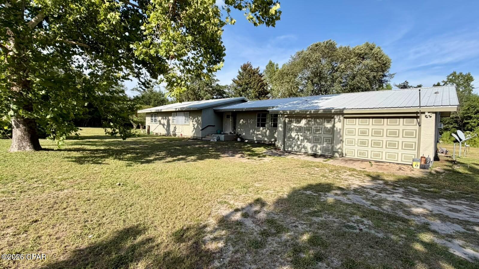Welcome to this beautifully maintained home situated on approximately 2 peaceful acres in Fountain, Florida. Offering 4 spacious bedrooms, 3 full bathrooms, and a flexible bonus room perfect for a home office, playroom, media room, or guest space, this property provides the space and versatility today's buyers are looking for.

    Effective built date 1994, Inside, you'll find beautiful hardwood flooring throughout most of the home, along with numerous recent upgrades that provide both comfort and peace of mind. The kitchen has been refreshed with new quartz countertops (2024), while major improvements include a 2024 metal roof, new insulation throughout the home, energy-efficient windows installed in 2022, a 5-ton HVAC system that's only two years old, and a tankless water heater. A 4-Point Inspection completed in February 2024 further reflects the home's excellent maintenance. The home is also equipped with a Generac generator plug-in, making it easy to connect a portable generator when needed.

Step outside and enjoy the privacy and freedom that come with country living. The expansive 2-acre lot offers endless possibilities, with plenty of room for gardening, outdoor entertaining, recreational vehicles, or simply relaxing and enjoying the peaceful surroundings. An above-ground pool, attached two-car garage, and detached storage building add even more value and functionality to this exceptional property.

If you've been searching for a move-in-ready home with generous living space, modern updates, and room to spread out, this Fountain property is one you won't want to miss.
