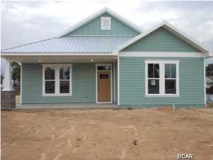 NO Home Owner FEES, NO Restrictions!!! NEW 4BR-2.5BA CRAFTMAN STYLE 1-STORY HOME JUST 1 BLOCK FROM S. LAGOON AND PUBLIC BOAT RAMPS AND 3 BLOCKS TO GULF. READY TO CLOSE NOW. Other features of this high quality home are; 9' smooth finish Ceilings * Granite counter tops * Elite Series Stainless Steel Appliances, Concrete siding (Hardy Plank)* all vinyl clad high energy efficient windows * Fiberglass exterior door * Covered rear patio with bead board ceiling, clg fan * Covered Front porch with BEAD BOARD ceiling * Double wide driveway. THIS HOME HAS TOP OF THE LINE FEATURES LIKE RECESSED LED LIGHTING, CUSTOM Bead board CABINETS, WIND STORM PACKAGE (lowest Insurance rates)Not in Flood plain, 2X6 EXTERIOR WALLS, CORNER LOT WITH ROOM FOR AN RV AND A BOAT. IF YOU ARE LOOKING FOR A TOP OF THE