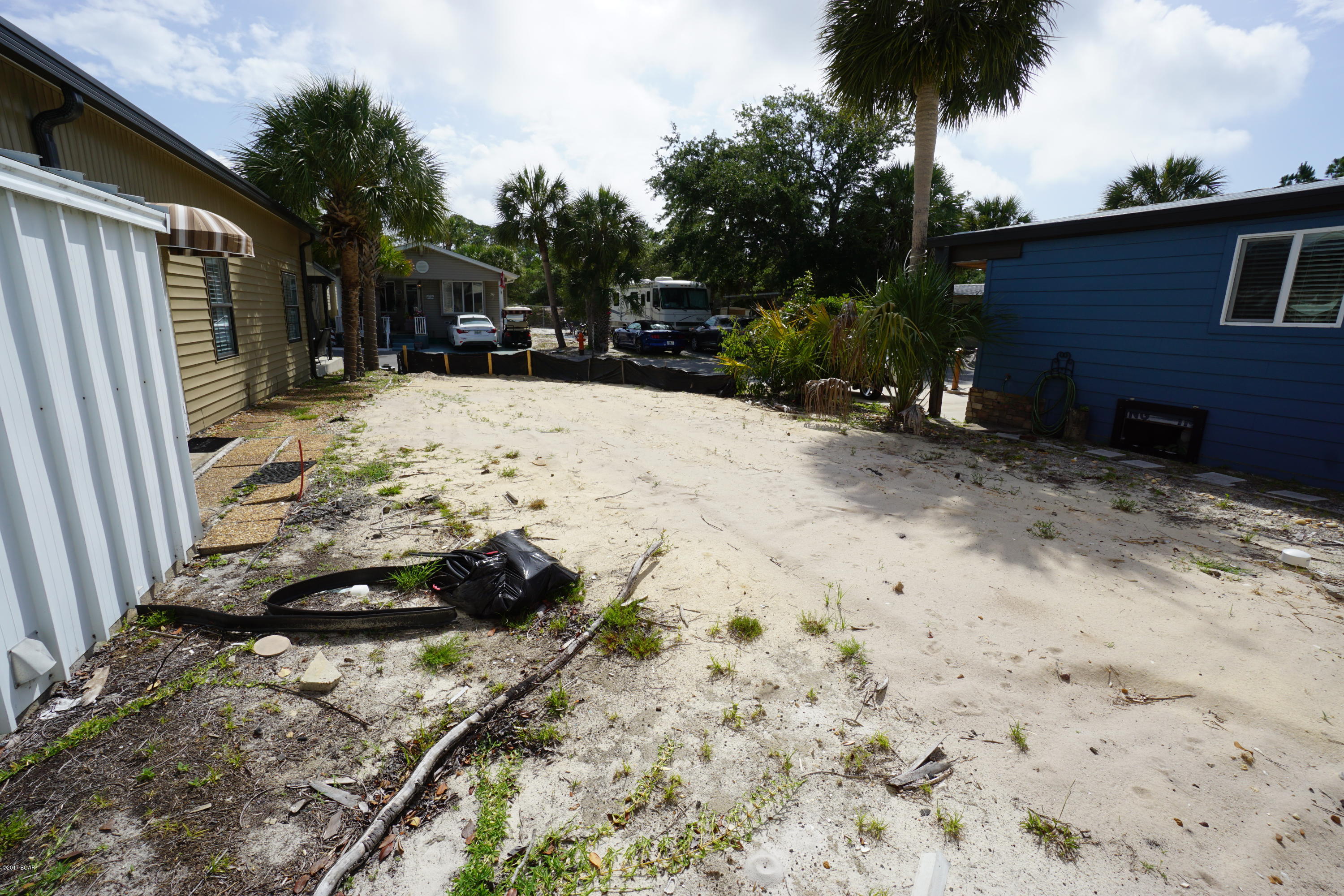 Fantastic opportunity to own in Venture Out! Build your dream home or bring your RV.  This lot is a in a wonderful location within the resort. Venture Out offers BOTH beach and bay access! The resort also has 2 salt water pools, one heated, tennis, golf, shuffleboard, playground, basketball, fishing pier, boat dock with slips & boat ramp. Venture Out is a golf cart community that has exploded in popularity within the last few years. A gated, pet friendly community that's great for full time residency or just to vacation. 24 hour security & friendly atmosphere. It's all here in Venture Out!