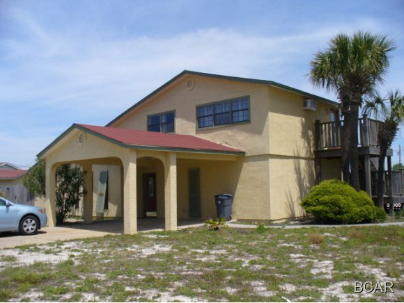 Upstairs, 1 bedroom/1bath apartment. Beautiful Gulf View, Pool, Fully Furnished, Oven/Range, Refrigerator, Microwave, Dishwasher, Fenced Yard. Shared Pool. Electric, Water, Garbage, Sewage, Telephone, and basic Cable Included. 12 month lease. Small pet negotiable.