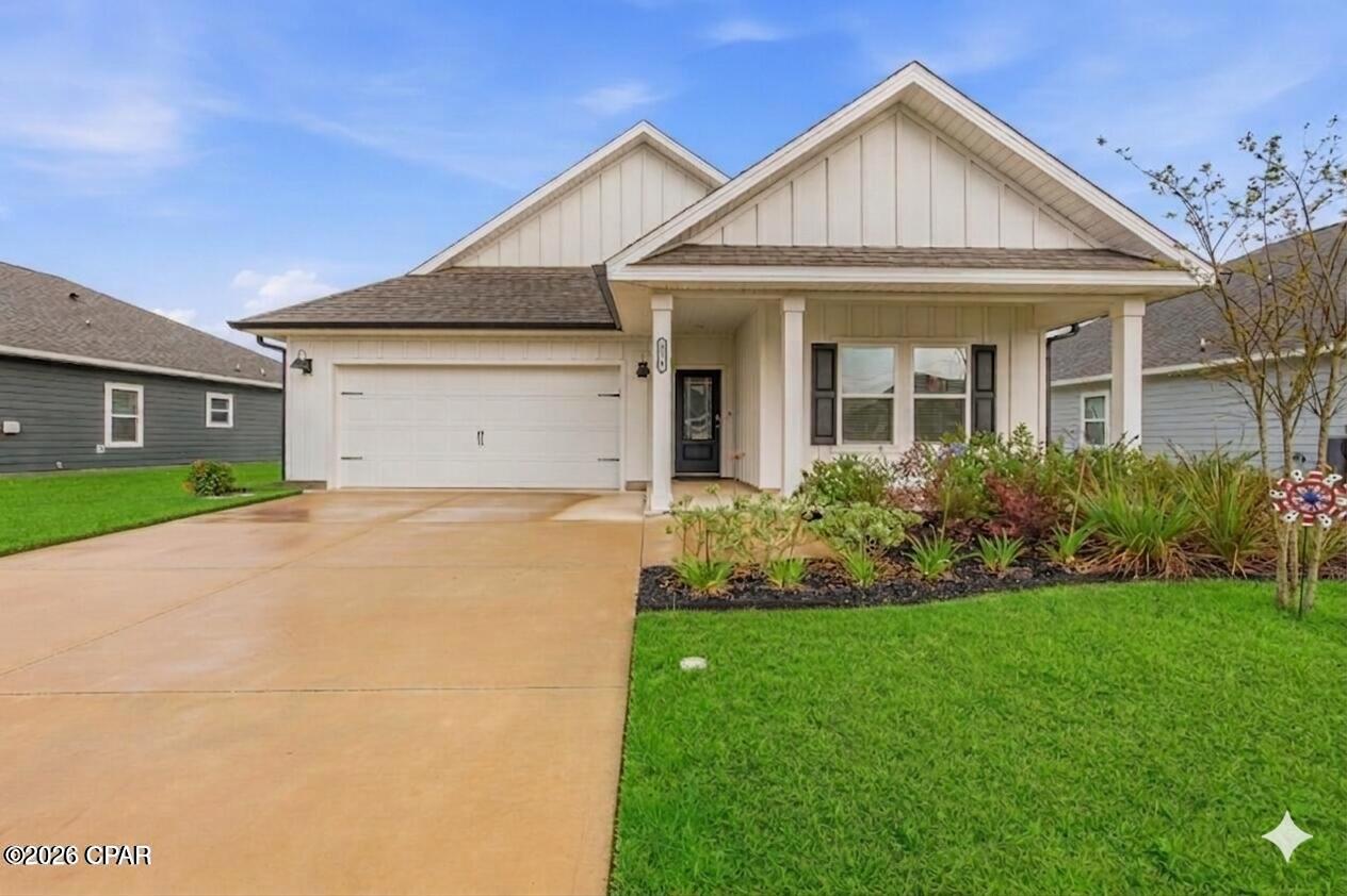 This meticulously maintained 5-bedroom, 3-bathroom residence offers a massive value advantage over standard new builds. This home has been upgraded with over $20,000 in premium additions--all bought, paid for, and ready for immediate enjoyment. The popular Riverside floor plan is designed for maximum efficiency and privacy, featuring a spacious open-concept kitchen and living area anchored by elegant quartz countertops and white cabinetry. Unlike the builder's standard package, this kitchen has been upgraded with the premium LG ThinQ smart appliance line, including an app-controlled French door refrigerator. The interior flow is further enhanced by thoughtful details that provide both safety and a sleek, uniform aesthetic, such as the upgraded cordless white blinds installed throughout the home. Every bathroom has been elevated with premium rain-style and dual-head shower fixtures, transforming everyday routines into a spa-like experience. For the tech-conscious family, the home is fully integrated for security and climate control, featuring a Google Nest doorbell camera, a Nest thermostat, and a LiftMaster smart garage system with exterior keypad and app functionality. Durable EVP flooring flows through the main living and wet areas, ensuring the home is as practical as it is beautiful. The excellence extends to the exterior, which stands out with superior curb appeal and structural upgrades that you won't find on a standard lot. Significant investments have been made to protect the property, including the installation of a full privacy fence with decorative solar lighting and oversized 6-inch black gutters for optimal drainage. The front yard features professional landscaping, and the entire property is serviced by a programmable four-zone irrigation system with rain sensors. Located in the Liberty community, this home offers the privilege of being just a short walk to the 7,500 square foot amenity center, complete with a resort-style pool, splash pad, playground, and fitness center. It is a strategic choice for military personnel, situated just 15 minutes from Tyndall Air Force Base and close to the shopping and dining in both Lynn Haven and Callaway. Priced at $375,000, this home represents an incredible value proposition for growing families and especially VA buyers because the current VA loan is assumable with a 4.125% interest rate. You are gaining thousands of dollars in high-value upgrades that are already professionally installed. Why wait for a contractor when you can have it all now? This one will go fast Call Today!
