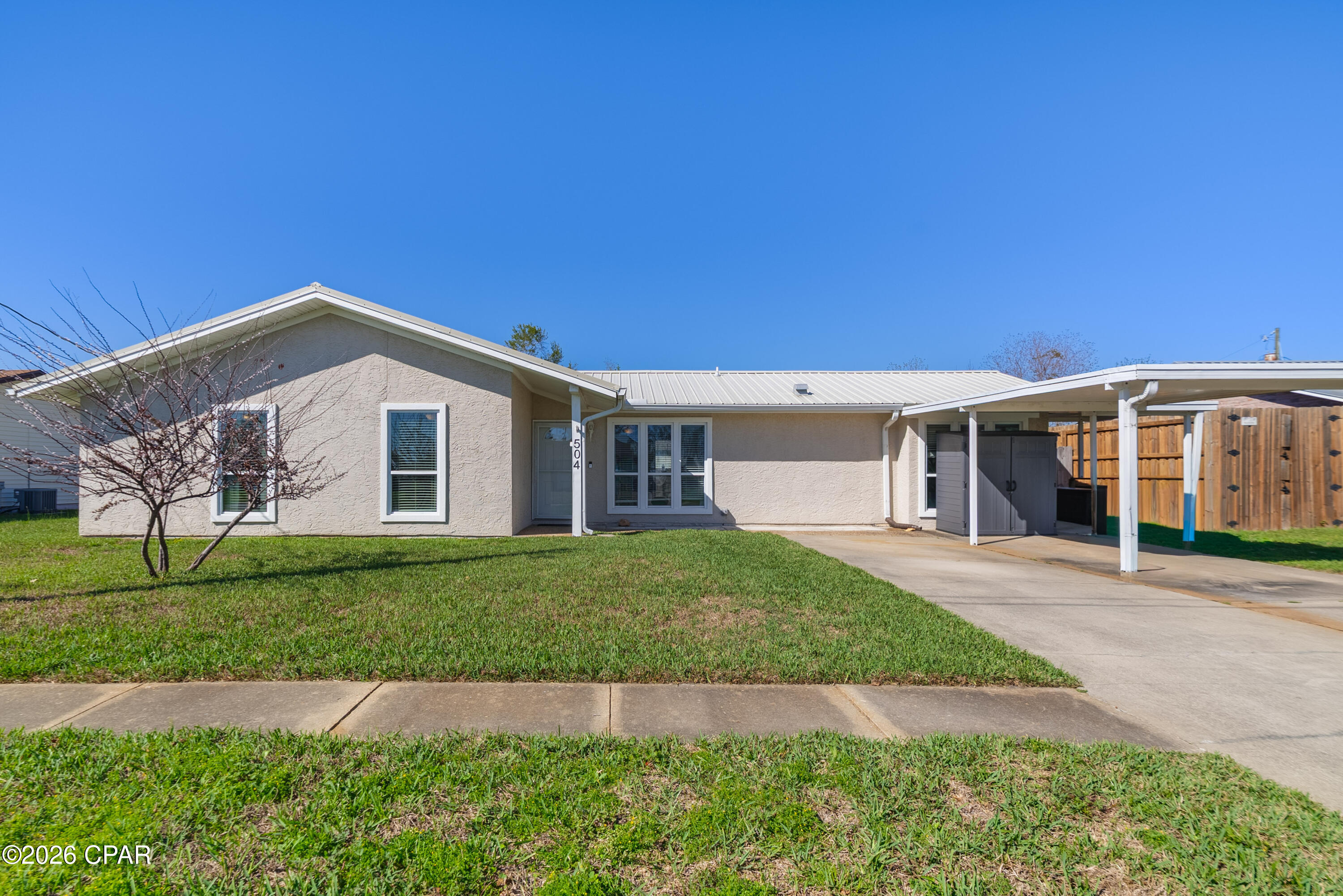 Welcome to this incredibly maintained, move-in-ready Lynn Haven gem! This home offers the ultimate peace of mind with all major updates already completed, including a 2022 HVAC, a 2019 metal roof, and a 2019 tankless gas water heater for endless hot water and peak energy efficiency. Upon entering you'll observe LVP wood-look flooring throughout, offering a stylish, low-maintenance lifestyle with no carpet. The bathrooms have been fully renovated with new vanities and elegant tile, providing a fresh, contemporary feel. For the cooking enthusiast, the kitchen features a gas stove and a newer refrigerator. The 3bd/2ba layout is further enhanced by a versatile bonus room that is perfectly suited for a home office, hobby space, or workout area. There is a dedicated laundry room as well. On the exterior, the property is designed for maximum relaxation and functionality with a patio area, fully fenced backyard, large shed, and a carport out front. Not to mention the larger driveway that fits up to 4 vehicles. 

The location is exceptionally convenient for both errands and leisure. This property is situated less than a 5-minute drive from Publix, Walmart, Cain Griffin Park, and a variety of dining options. When it's time for the beach, it's only around 25 minutes from the white sands of Panama City Beach. For travel, the Northwest Florida Beaches Airport (ECP) is an easy 22-minute commute. This home is exceptionally clean, turnkey, and priced right to sell at $259,900. Schedule your showing today! A video tour is also available