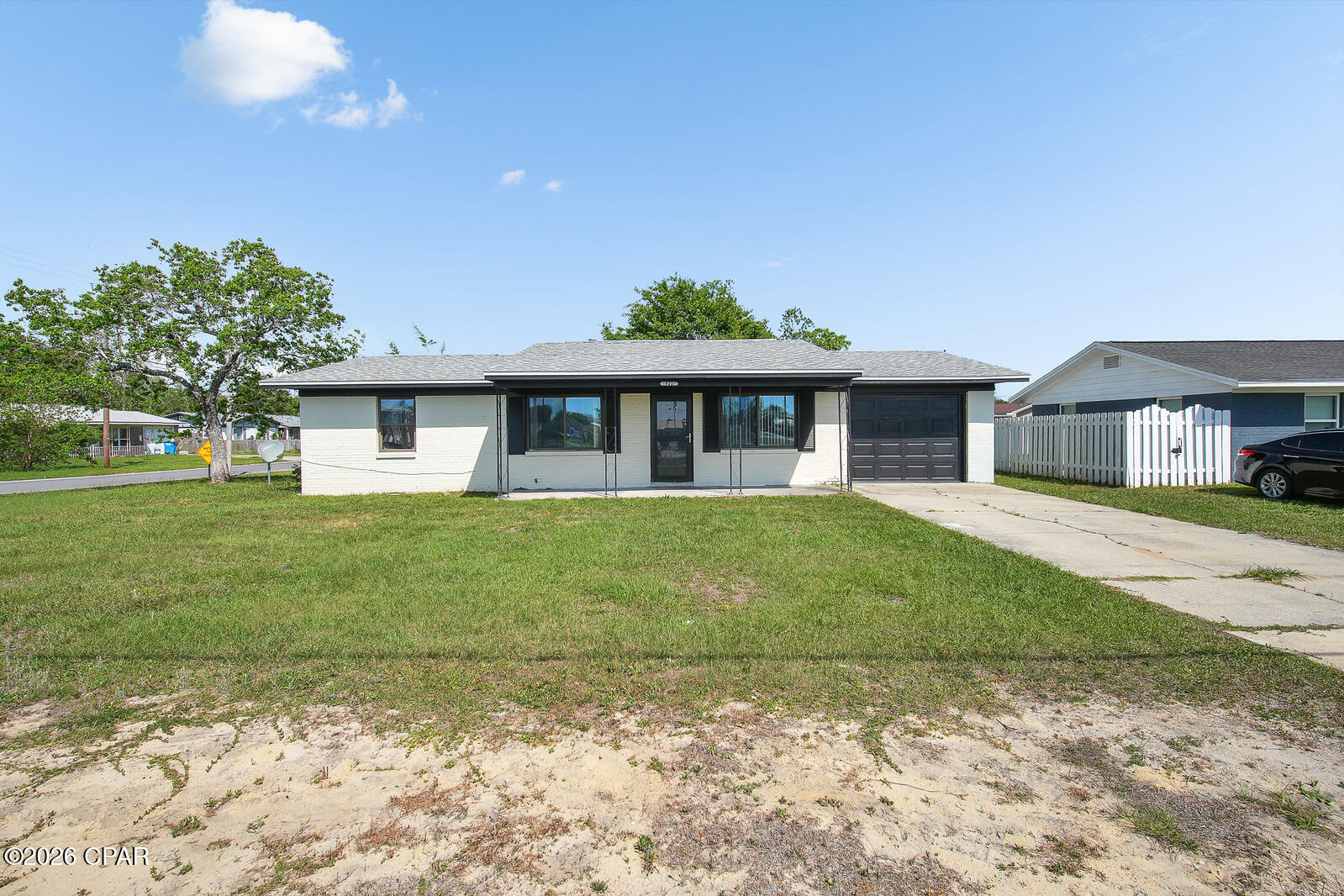INVESTORS & FIRST-TIME HOMEBUYERS -- Don't miss this opportunity!

This solid brick 3-bedroom, 2-bath home is full of potential and ready for its next owner! Whether you're looking for your first home or an investment property with excellent rental potential, this one is worth a look.

Enjoy a spacious, light-filled living area, generously sized bedrooms, and a handicap-accessible primary bathroom featuring a walk-in shower and grab bars. The kitchen offers abundant cabinet space, while the home features parquet flooring throughout--no carpet! Recent updates include new flooring, a remodeled bathroom, double-pane windows, a new A/C, and a new water heater, giving you peace of mind for years to come.

Outside, you'll find a beautiful corner lot with mature trees, a single-car garage with washer/dryer connections, and plenty of outdoor space to enjoy.

With just a little TLC, this property has the potential to shine as a wonderful primary residence or a fantastic income-producing rental. Schedule your showing today!