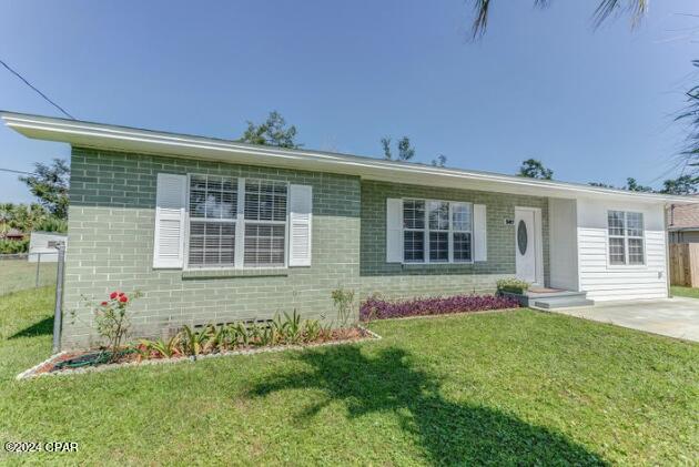 Call TODAY about this adorable home in Lynn Haven!  This 3 bedroom 1 bath home is located a short walk from all of the downtown amenities that Lynn Haven has to offer including playground, amphitheater, community sports courts as well as the public boat ramp and fishing pier.  This home has been updated from top to bottom and is in GREAT condition.  You will love the fenced back yard, and pets ARE negotiable!  Washer/Dryer are included but not warranted in Lease, owner is also leaving lawn equipment (also not warranted).  You will not find a better home at this price with this GREAT location!! Text a photo of your ID to the phone number in this listing and we will set you up with a showing within 1 business day!