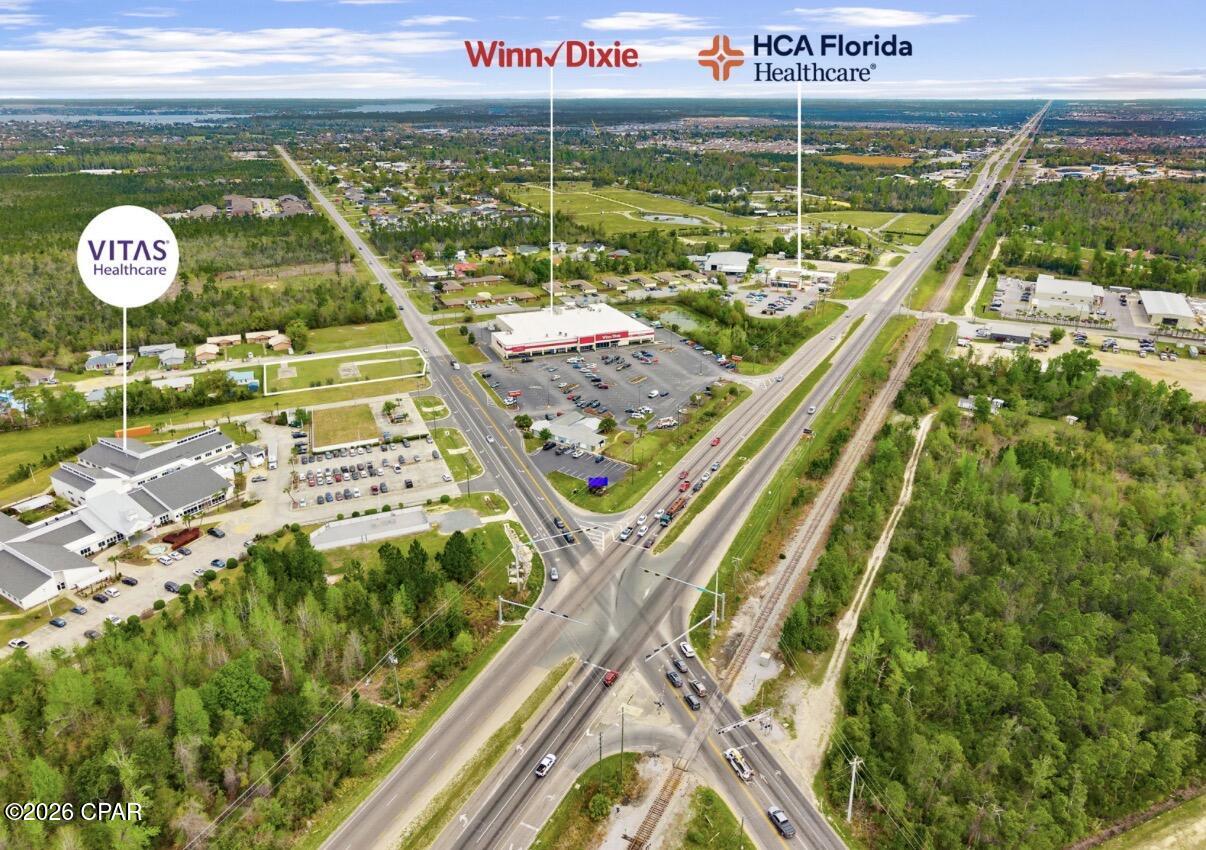 Large corner commercial lot -- cleared and ready for development! Prime location just off Hwy 231 in the heart of Bay County's thriving retail corridor, directly across from Winn-Dixie and and adjacent to Community Health & Rehabilitation Center. 

Enjoy excellent visibility, high traffic exposure, and convenient access. This property is ideally suited for retail, medical, office, or service-oriented businesses looking to grow in a high-demand area with a strong consumer base.

Great opportunity in a rapidly growing commercial corridor!