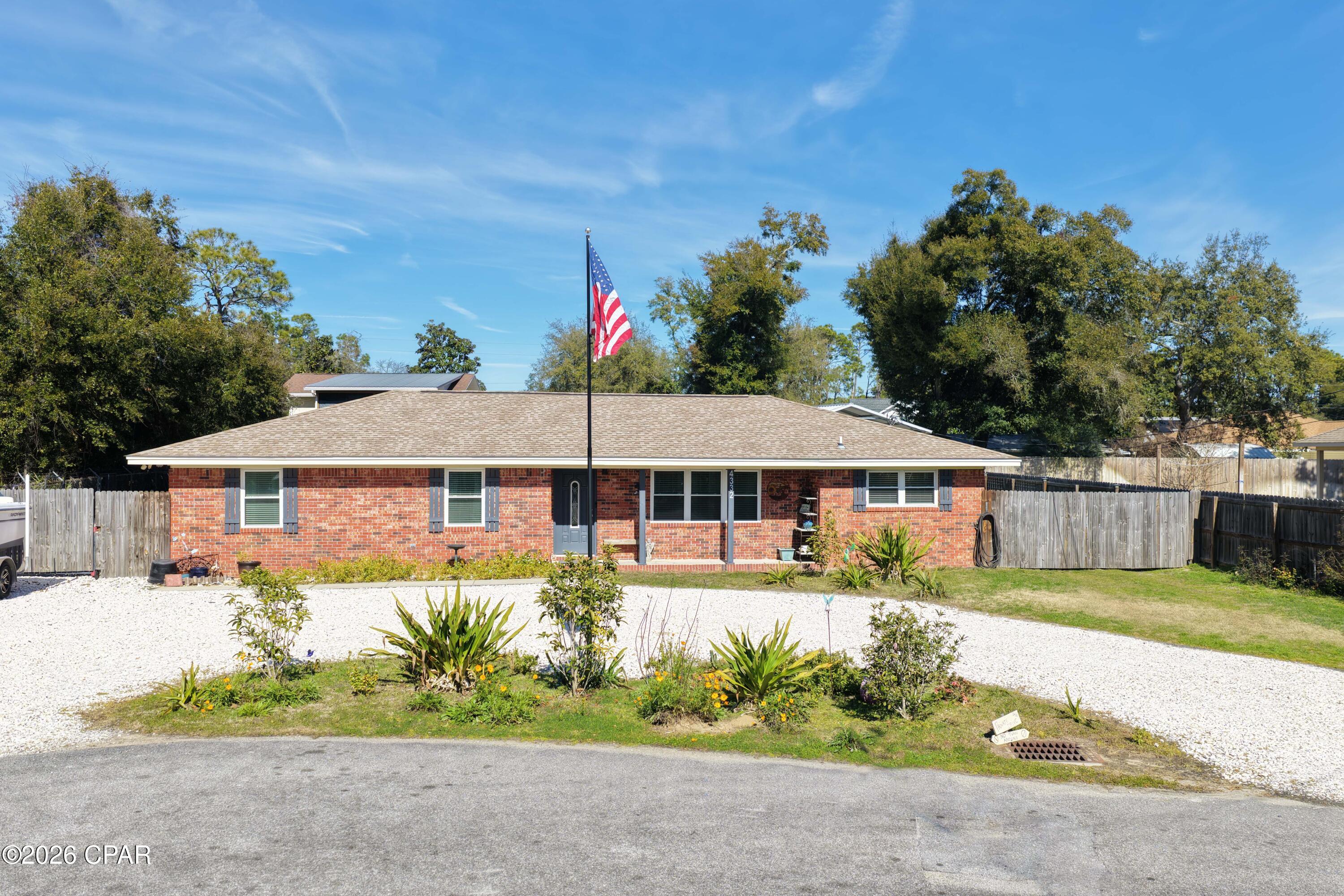CURRENTLY UNDER CONTRACT, SELLER WILL CONSIDER BACKUP OFFERS Well-maintained 3-bedroom, single story,  all-brick home on two oversized lots!  Ideally located at the end of a quiet dead-end street in Panama City Beach, you are also close to St. Andrews State Park, the Navy base, Bay Point Golf Course, and just minutes to beaches, shopping, and dining.  Recent updates include a new roof, septic tank, and windows. The open-concept floor plan is perfect for everyday living, while the fenced backyard shines with a she-shed, 20x35 detached carport with workshop, RV hookup with outlet, outdoor shower, and plenty of room for a pool and all your toys. No HOA and short-term rentals are allowed -- rare find with endless possibilities! Call today and make this your next home or investment in Panama City Beach!!