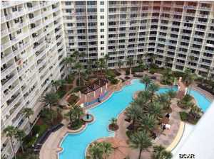 GULF FRONT UNIT - LOCATION, LOCATION, LOCATION!!! (true, gulf front unit, not tucked away in the corner). 180 DEGREE, UNOBSTRUCTED GULF VIEWS FROM YOUR BALCONY. THE BEST OWNER PARKING SPACE ON THE 7TH FLOOR - LOCATION, LOCATION, LOCATION!!! LARGEST 1 BR, FLOOR PLAN IN COMPLEX (980 sq ft). This unit has a foyer with a window, which is a rare find. FULLY FURNISHED, 1 BR/2 BA with bunk room. Master Suite has a large walk in closet, a 5x5 ft custom made owner storage room that locks as well as a 3 x 3 ft second owner storage that locks. Master Bath has a large, beautiful, cultured marble vanity, tub/shower combo. It has expensive, custom drapes, quality furnishing, very nice art work, kitchen has beautiful, granite counter tops, a breakfast bar with extra seating/with bar stools,