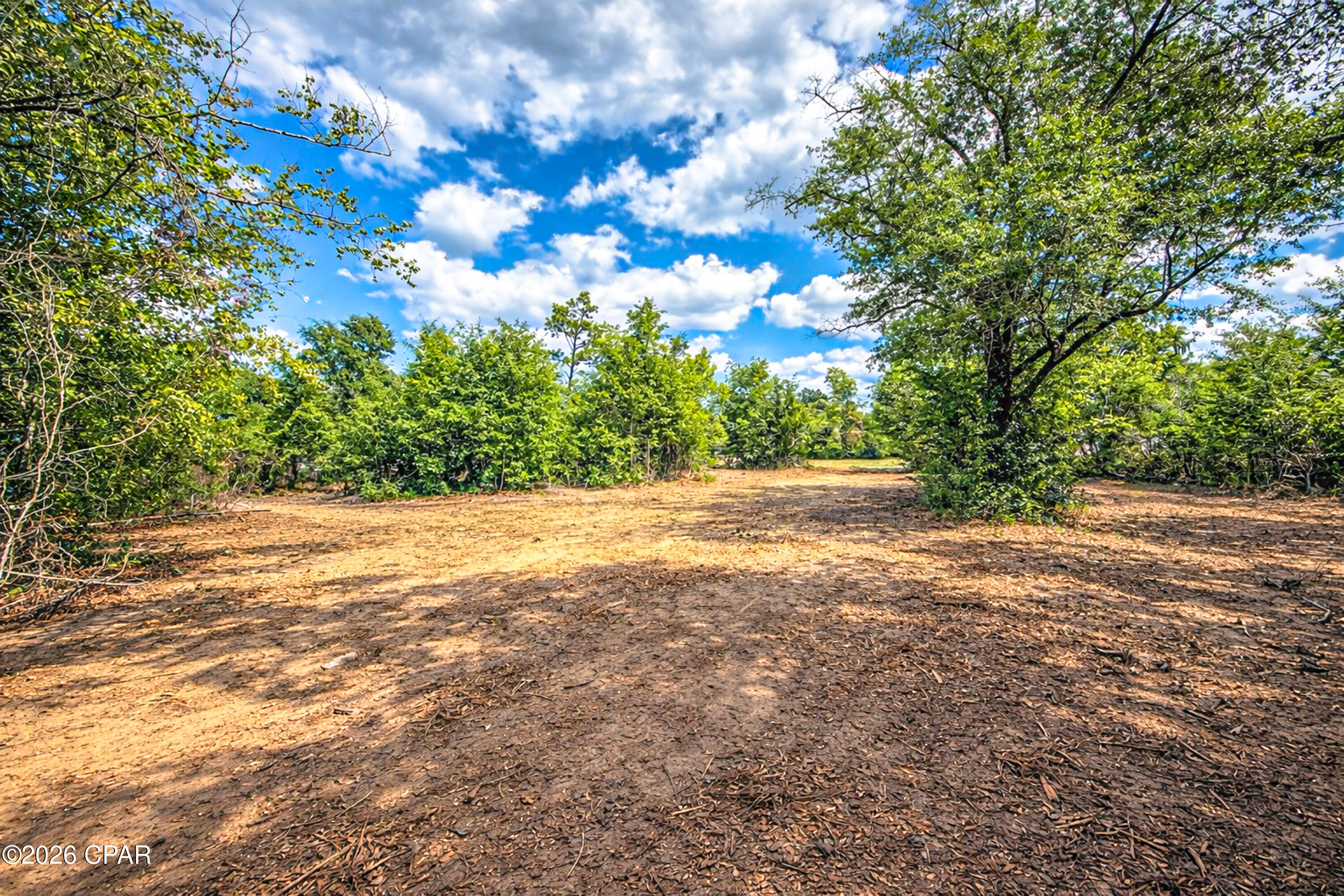Very nice over 1 full acre lot located on a PAVED road just outside of Panama City.  The property is located convenient to everything Panama City has to offer, yet with the huge property gives ample space.  It is located in the rear of the subdivision which would have little drive by traffic.  The property possibly could be split into two 1/2-acre parcels.  Possible Owner Finance with 20% down at 8.5%, 25 years, payment of $383.29/month.  OR seller will do a 1-year Lease with Option to Purchase:  $2,500 down, $500/month, $100 of each payment to credit the purchase price.  All information is approximate and taken from the Public Records.  If anything is important to the buyer, please verify.