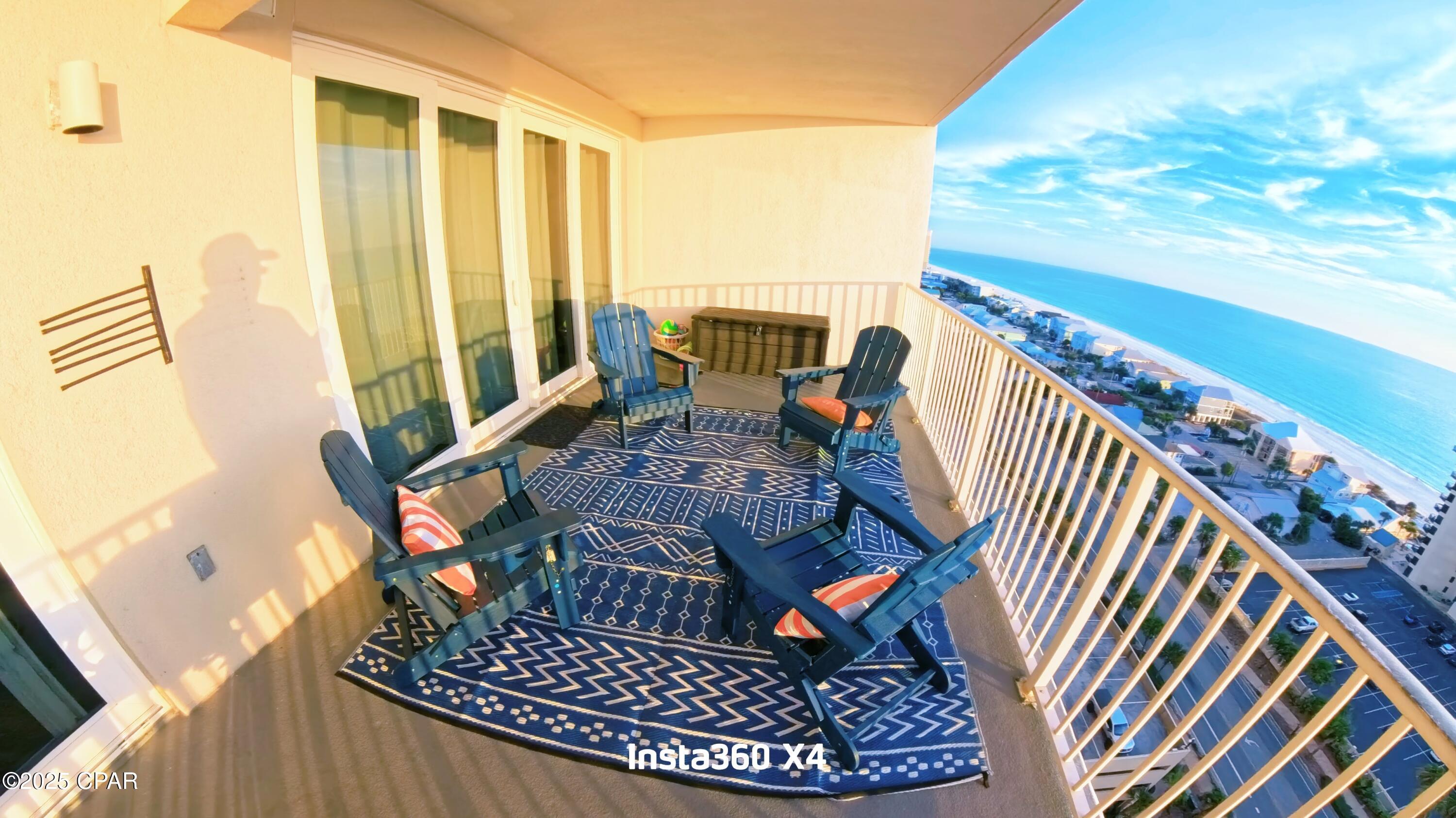 When you want total relaxation and a beach condo that reflects your style and comfort, access to the worlds most beautiful beaches and the best available amenities around, then check out Laketown Wharf Unit #1412.
This is a 3 Bedroom, +Bunkroom, 3 Full Bathrooms, NO CARPET (as it is all LVP flooring in the bedrooms and living room, Tile in the Kitchen, halls and baths). The best part about this unit is the 30'x10' balcony overlooking the GULF! You will get the very best sunrise & sunsets each day. The master bedroom also faces the GULF with sliding hurricane doors out onto your balcony. The split bedrooms at the front of the unit are beautifully decorated and have private baths and the bonus bunkroom also connects to one of the bedroom baths.
Now for the chefs and the foodies, enjoy plenty of cabinets, granite counters and a big Island kitchen. This one has been remodeled and appliances are all upgraded to stainless steel, you will love the subway tile backsplash and new modern lighting too. The kitchen is overlooking the Grand-room and the wall -to-wall views of the GULF! Take a look at all the other  big 3 bedroom units with 1681 sq. ft. and you will see the difference in this gorgeous unit. The COA dues are reasonable and include: Insurance, WIFI- Internet, Cable, Water, Garbage, Pest Control, 2 Story Gym, Pickleball, Boardwalk, Access to Restaurants, Shops and Gated Beach Access. This condo is being SOLD FURNISHED! and RENTAL READY! Ask listing agent about possible property management companies for rental revenue opportunities.