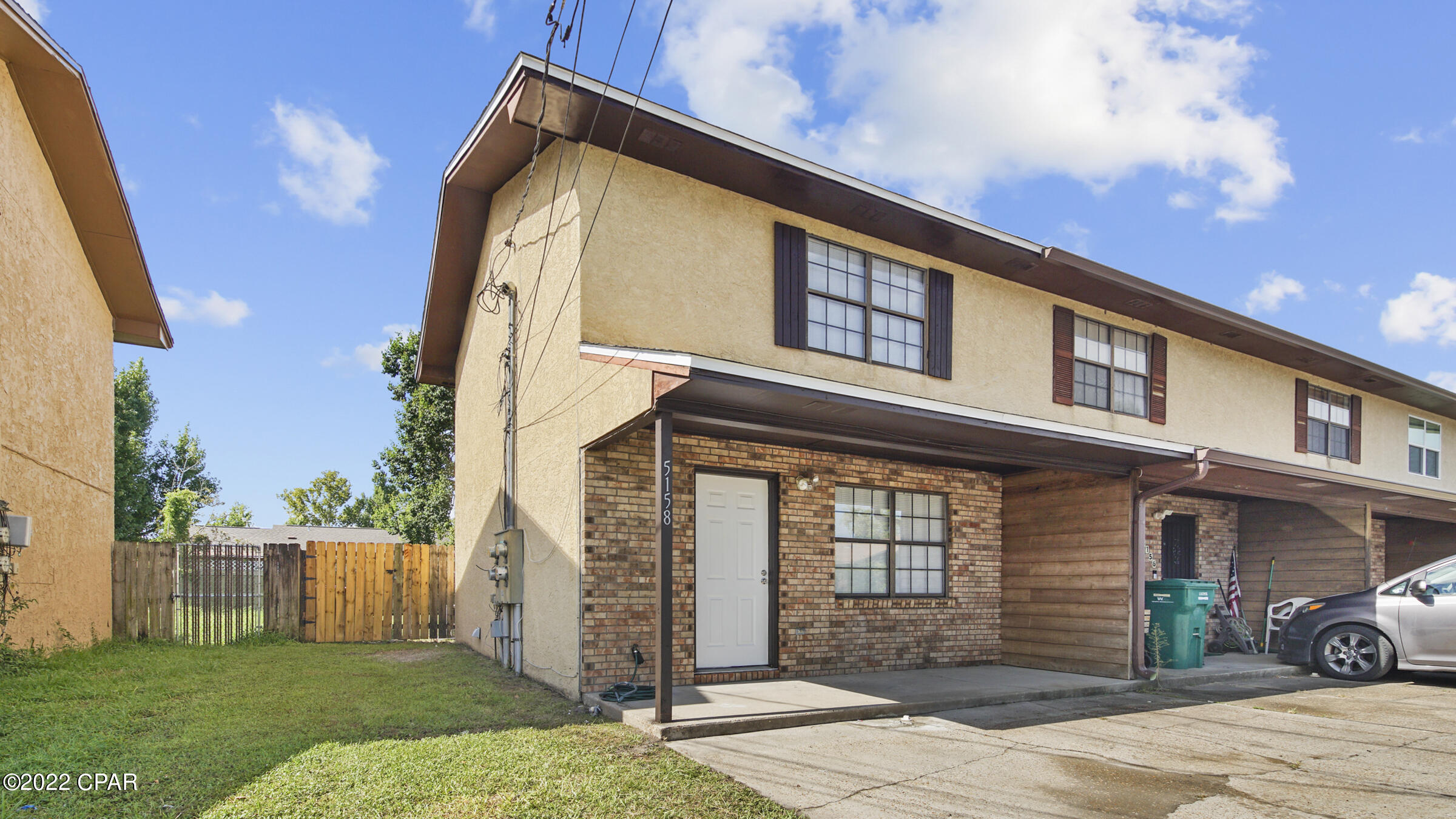 Completely remodeled townhome! New items include A/C, hot water heater, freshly painted,  kitchen appliances, and new roof 7/2022! Affordable townhome that is centrally located to shopping and Tyndall Air force base. This home will come with a transferable roof warranty! Enjoy the fenced in back yard with plenty of shade from beautiful tree. Updated kitchen included subway tile back splash, New countertops, new appliances. Hard surface floors through out this home!