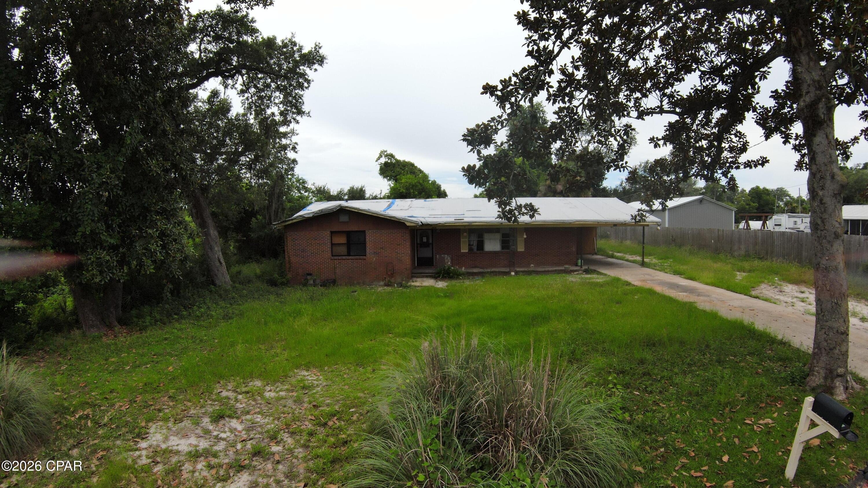 Investor special in Panama City! This 3 bed, 2 bath home features approx. 1,848 sq ft of indoor living space and sits on a spacious quadrouple lot with strong renovation, rental, or redevelopment potential. 

Property needs a full rehab and is best suited for an investor, builder, or buyer looking for a value-add project. Possible upside may include renovating the existing home, holding as a rental, or exploring lot-split/new construction potential. 

Buyer to verify zoning, land use, setbacks, utilities, permitting, measurements, and development options with city/county.