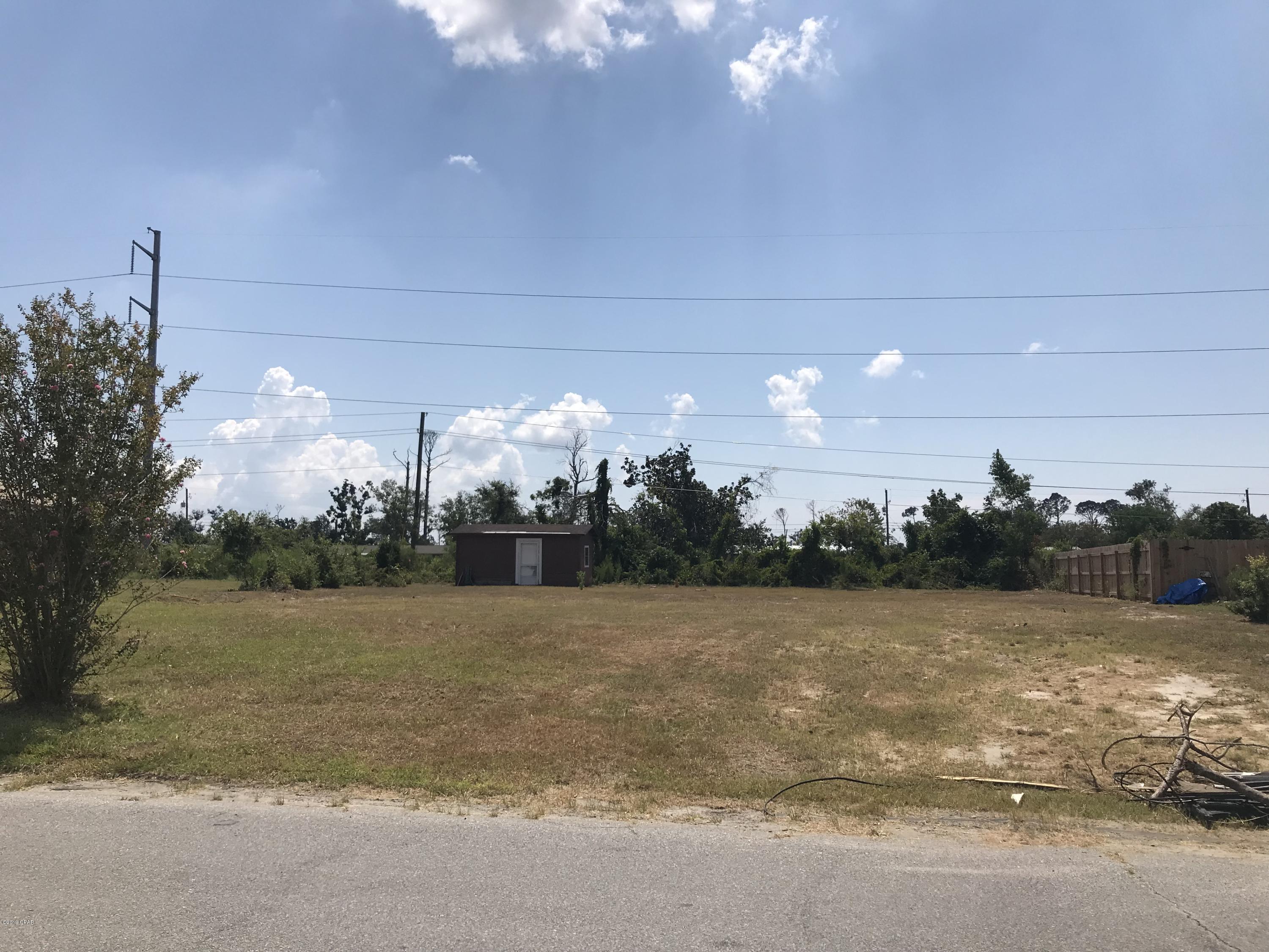 Fantastic Location! This lot is in town and convenient to Gulf Coast College and Hathaway Bridge. Perfect location to build a home. Cleared and ready to go! Not in a flood zone!