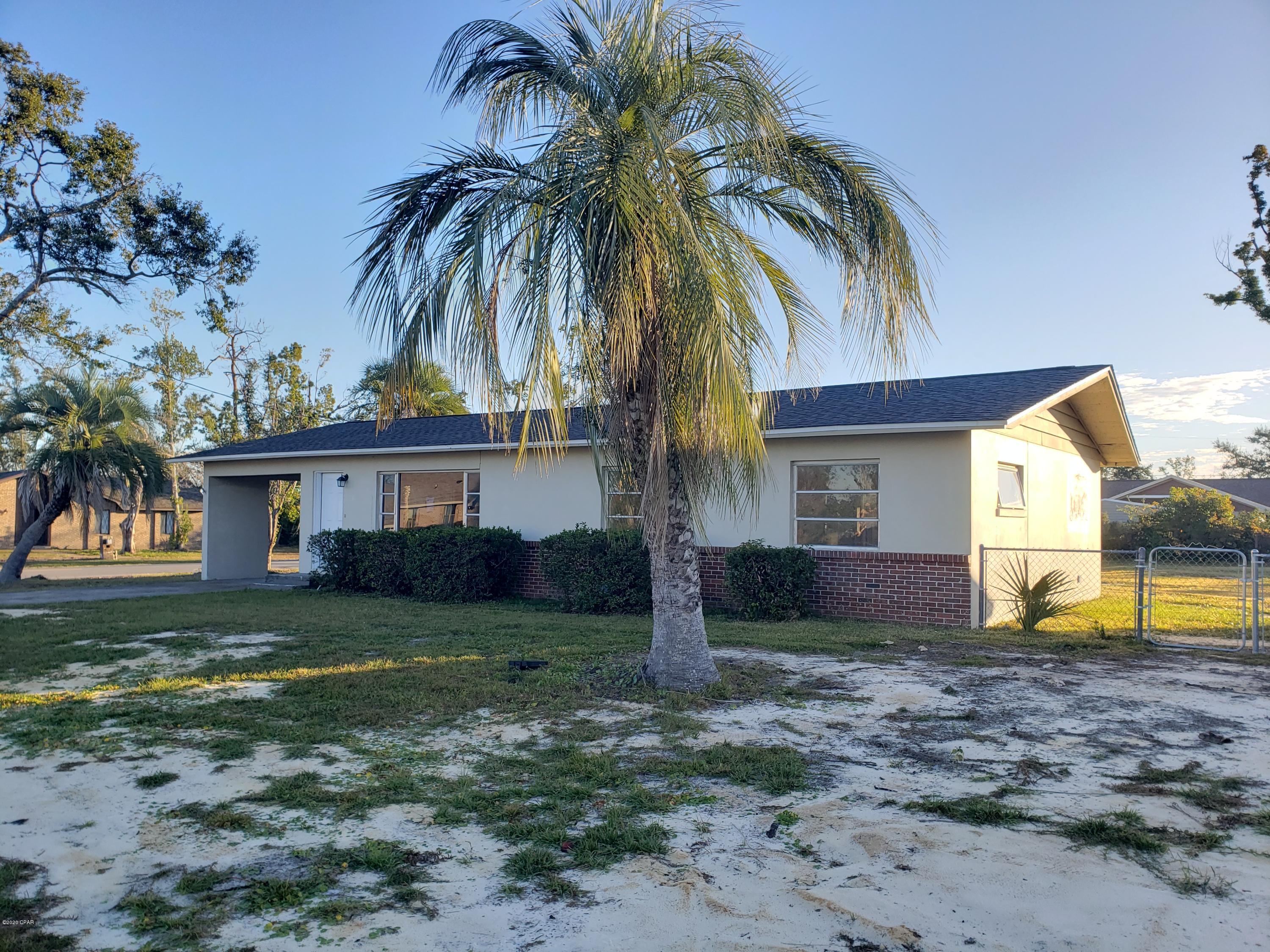 Newly remodeled 3 bedroom 2 bath with bonus room and carport.  This home features a large corner lot, large living area, bonus room that opens up to the back open patio, laundry room with storage benches, new kitchen cabinets and appliances.  This home has a covered patio and 3 exterior storage closets.