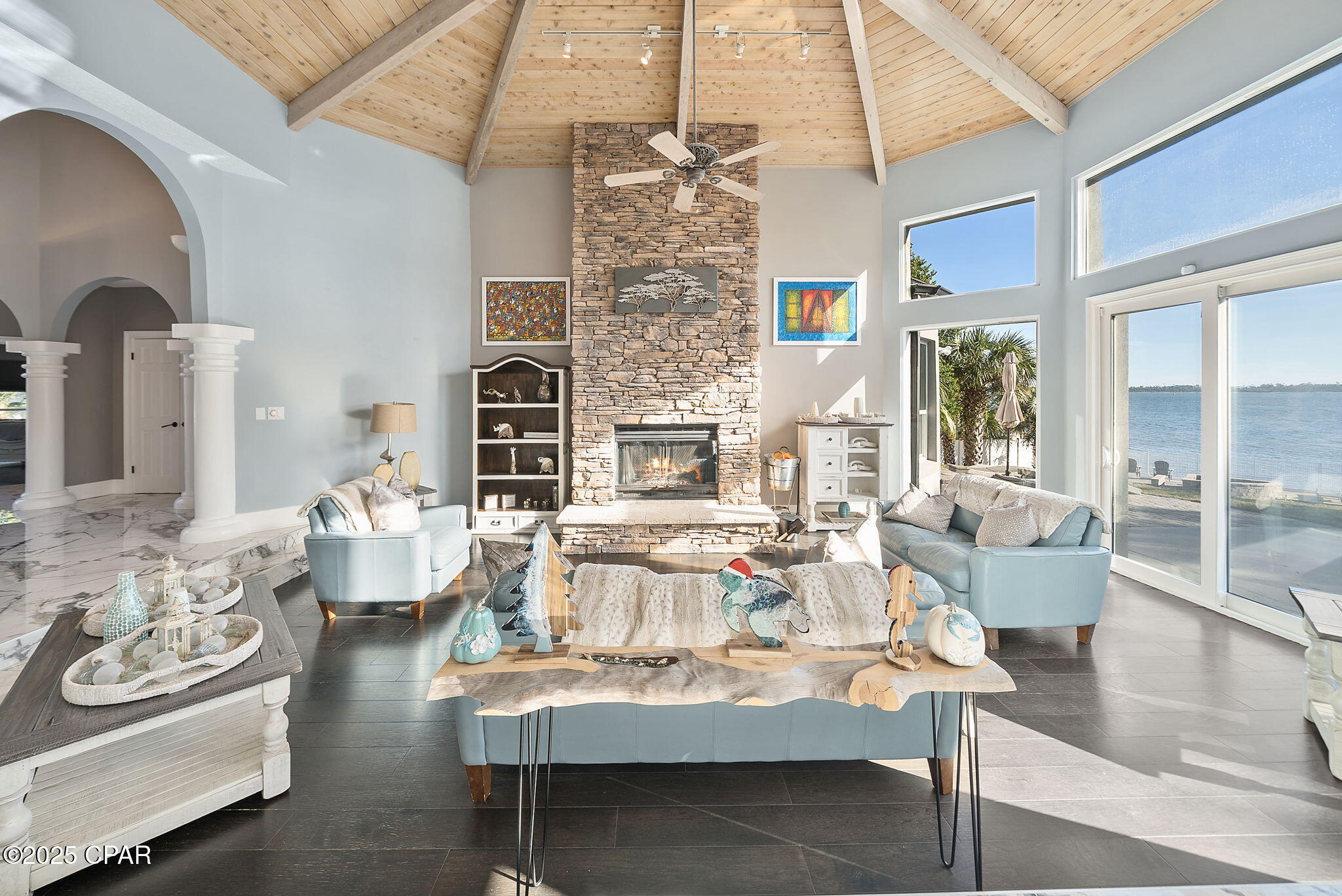 ***Sellers have called for highest and best.  All offers must be submitted by 4 pm today 11-17-25 and with an anticipated response by the sellers no later than 8 pm today.  Please submit your strongest offer terms.  Thank you all for your interest in this property. ***
Experience true rare waterfront luxury on one of The Cove's most iconic bayfront addresses. Positioned perfectly to enjoy both sunrises and sunsets, dolphins galore , this ~5,649 SF estate offers over 400' of grandfathered pier (one of the longest remaining in the area) with 210v/110v power, water access, lighting for night fishing, and deep-water boating with easy access to the Gulf + Shell Island. Enjoy crystal-clear bay waters for snorkeling, dolphin watching right from your backyard, views for different fireworks year-round, and unforgettable evenings in your pool or spa overlooking The Bay. The back yard has one of the oldest and largest trees remaining in the area.  Designed for both multi-gen living & high-end entertaining, this 6BR / 5 and 2 1/2 BA residence features two pantries, hurricane windows, a full wet bar with icemaker + sink + fridge, separate wine bar, floor outlet in grand foyer for seasonal decorating, Bosch induction cooktop, Bosch dishwasher, dual ovens, dual refrigerators, and numerous recent upgrades inside & out between 2023-2025 including commercial 80-gal water heater, full 400A electrical modernization, newer AC, pier upgrades, new salt system, sauna, fencing, and more. Minutes to golf cart to yacht club dining, downtown arts, waterfront festivals and local culture — this is luxury Cove living at its finest.

Recent extensive capital improvements list available  in listing documents.  Standard Boat lift & jet ski lifts convey; jet skis do not convey but negotiable. Golf cart, furniture & select gym equipment do not convey but negotiable. ALL wall art or wall decor does not convey.  All outdoor furniture and deck equipment containers convey.  Security system conveys and buyers will have to obtain service. All TVs convey.  Buyer to verify measurements/use.