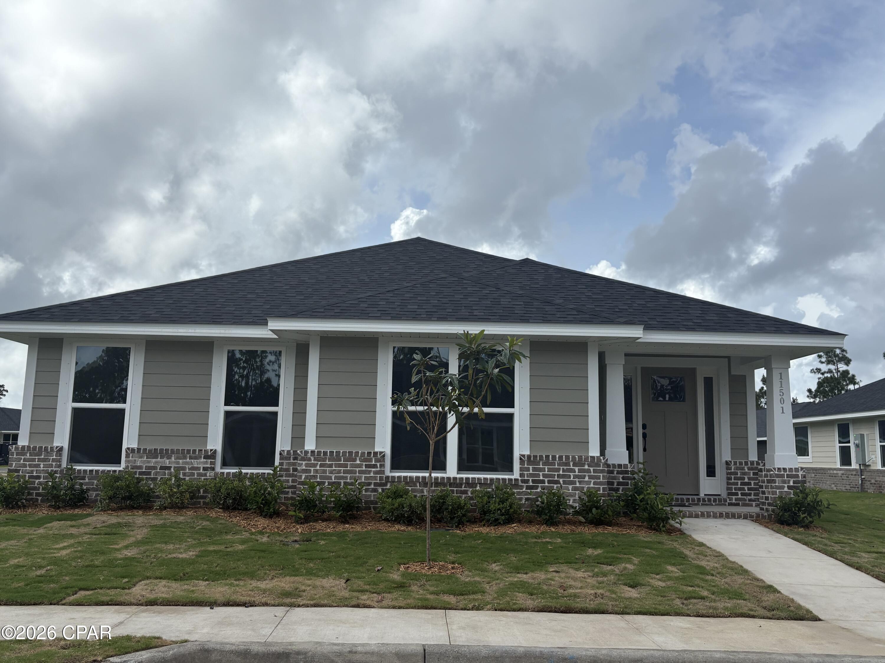 LIMITED OFFER: Get a tiered rate: 2.99% (Year 1), 3.99% (Year 2), then 4.99% fixed for life. PLUS MOVE IN PACKAGE INCLUDED & COVERING CLOSING COST WITH PREFERRED LENDER!!! Step into 2,201 sq. ft. of modern elegance in this stunning 2026 single-story retreat. Located in a premier waterfront community with direct Bay and Gulf access, this home perfectly blends style with daily practicality. 
The heart of the home features an expansive open-concept living area and a chef-inspired kitchen, complete with granite countertops, a large island, and a walk-in pantry. Relax in the private master suite featuring a spa-like en-suite bath and a massive walk-in closet. Durable and beautiful Core Tec Pro Plus flooring flows throughout, offering 100% waterproof protection perfect for coastal living. With energy-efficient construction, a customizable flex room, and a 2-car garage, this home is designed for both comfort and long-term value.