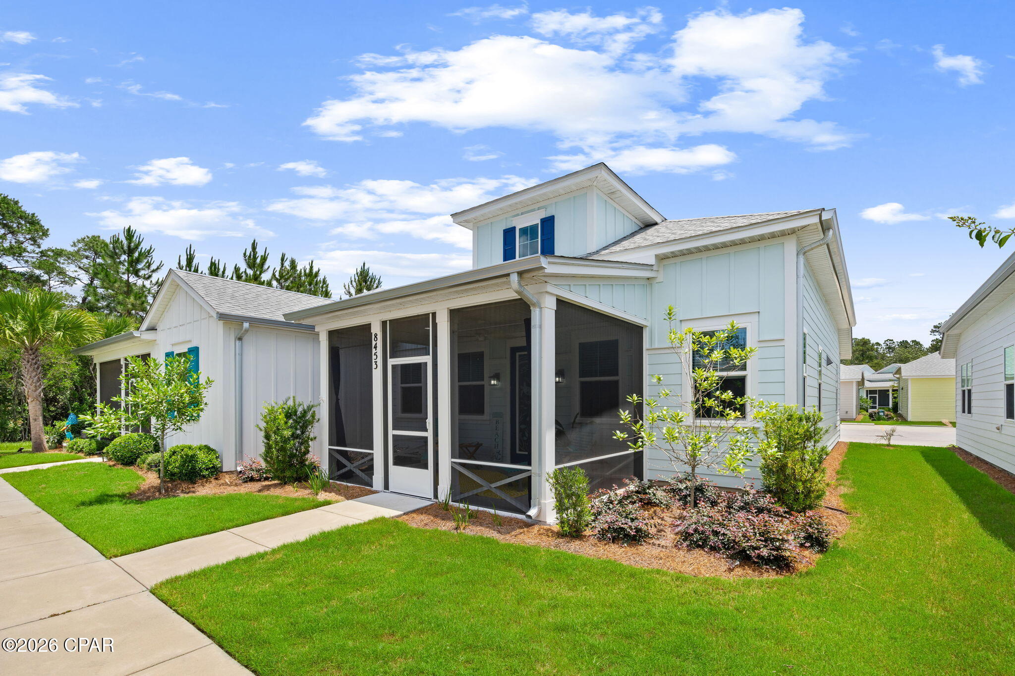 **MOTIVATED SELLER**- BAMBOO COTTAGE in Phase 5B of Latitude Margaritaville Watersound is where comfort meets coastal cool. 

Welcome to Phase 5B, one of the most desirable pockets in Latitude Margaritaville Watersound. This section is filled with charming cottages and villas, offering a little more breathing room and privacy than many other areas. From your front porch and screened front lanai, you're greeted by peaceful views of mature trees instead of a row of rooftops. It is the kind of setting that makes morning coffee taste better and evening wine last a little longer.

Location matters, and this one hits the sweet spot. You are positioned toward the front of the community, making it easy to slip in and out when you need to, while still just a short golf cart ride from Town Square and the exciting new commercial area being developed along Highway 79 by The St. Joe Company. Close enough for convenience. Far enough for peace and quiet.

Step inside and you will notice the upgrades right away. Beautiful blue Level Two cabinetry sets the tone in the kitchen, paired with laminate flooring throughout most areas of the home for a clean, coastal feel. The upgraded lighting package adds a classy, elevated touch that feels more custom than cottage. Blinds are already installed throughout, so there is nothing left to do but move in and start living.

The guest bathroom features Level Two cabinetry and granite countertops, giving your visitors a polished and welcoming space. In the primary bath, you will find a seamless glass shower door with floor to ceiling tile as well as granite countertops that add both luxury and durability. The walls throughout the home are painted a soft, light blue that feels like the Gulf breeze followed you home.

The screened porch on the front of the home is where this Bamboo really starts to sing. Semi private and framed by beautiful trees, it is the perfect place to unwind, read a book, sip something tropical, or watch your four legged best friend explore the green space. You can also hear the waterfall from a nearby swimming pool to help relax you even more. There is plenty of room out front to stretch your legs, walk your pup, and enjoy the simple rhythm of a community designed for connection and relaxation.

And then there is the lifestyle.

Living in Latitude Margaritaville Watersound is not just about owning a home. It is about live music in Town Square, afternoons at the resort style pool, fitness classes at the Fins Up Fitness Center, pickleball matches that turn into friendships, and dinners at the onsite restaurant overlooking the Intracoastal Waterway. Scenic walking trails wind through the neighborhood, neighbors wave as they pass in their golf carts, and the new commercial development along Highway 79 will bring even more convenience right to your doorstep.

This Bamboo Cottage is priced to sell, upgraded where it counts, and positioned in one of the best phases for privacy and accessibility. It is easy, breezy, and built for someone who understands that life is better when it feels a little like vacation every single day. Some photos have been virtually staged or digitally altered for presentation purposes.