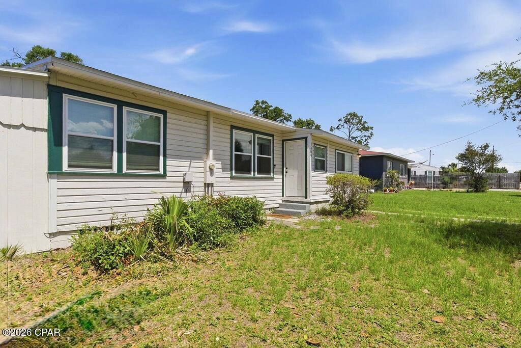 Nestled in the heart of Panama City's historic St. Andrews neighborhood, this classic 1950s ranch-style home at 1409 Arthur Ave offers the perfect blend of coastal living and investment opportunity. Featuring a highly functional 1,068 sq. ft. layout, this property is a rare find: it is situated in a Residential Single-Family (R-1) zone that explicitly allows short-term vacation rentals under City of Panama City guidelines!
Walk or bike to the vibrant St. Andrews marina, eclectic local dining, craft breweries, and popular waterfront parks. The home boasts a deep lot with plenty of room for outdoor entertainment or future expansions. Whether you are looking for an affordable primary residence, a coastal weekend getaway, or a rental investment, you can't beat this home's location or value.