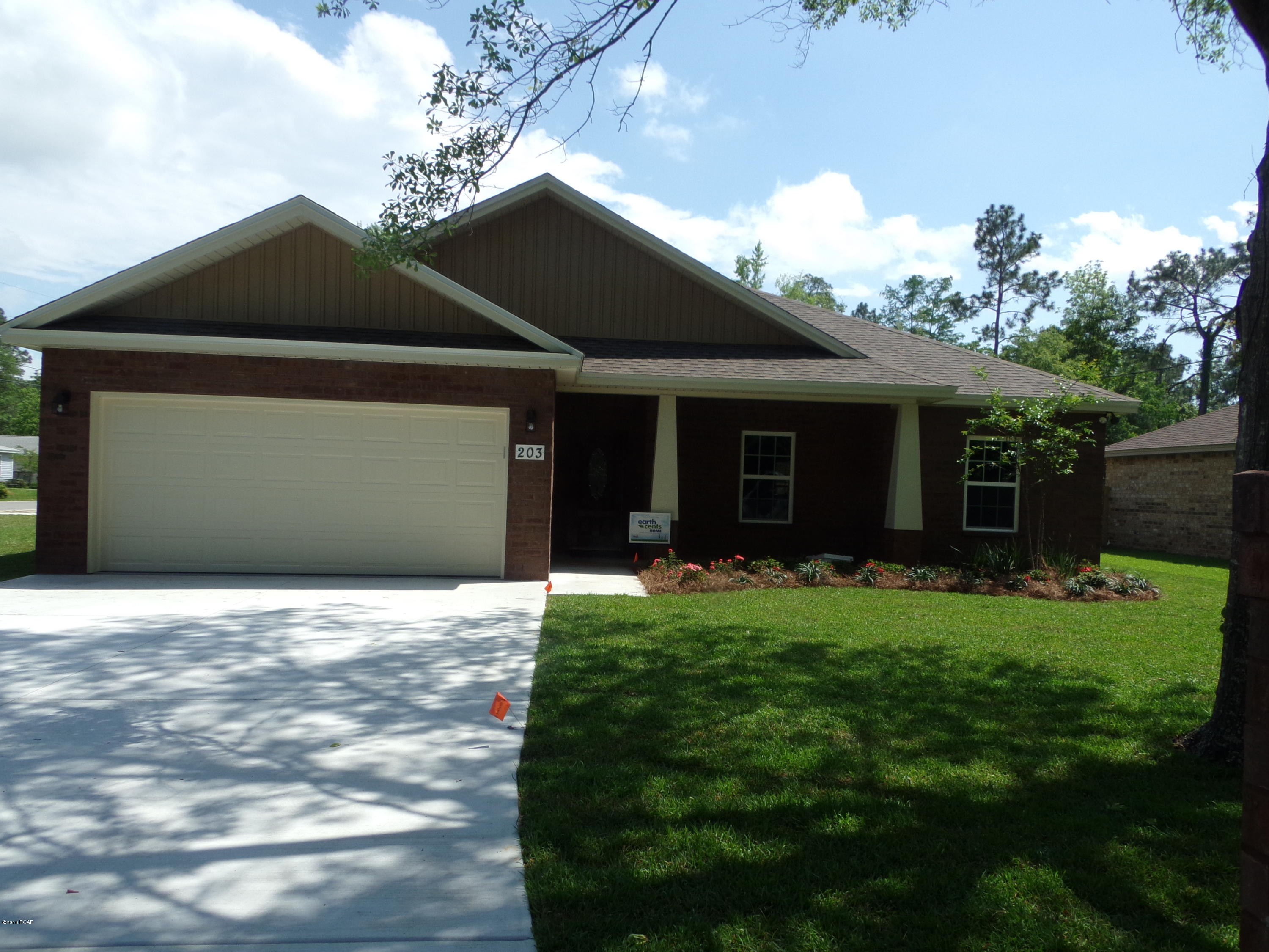 Upgraded Custom Built Home in Lynn Haven.  100% all brick 1,650 sqft, 3 bedrooms 2 full baths, open living room. Carpet & tile throughout home. Cultured Marble in Master bathroom, two walk-in closets, linen closet and double sinks. Ceiling fans, large laundry room. Kitchen offers, Granite counter tops, disposal, Microwave, dishwasher, self-cleaning smooth top stove and refrigerator with ice maker. Home has tray ceiling, crown molding, carpet & tile. covered front and back porch. Local builder who focuses on quality built homes! 1 block from fire & police department.