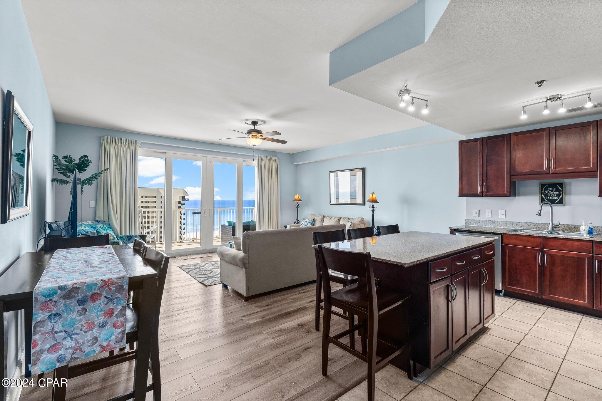 Turnkey, income producing condo in the heart of Panama City Beach. This fully furnished 1BR/2BA unit includes a converted bunk room with a queen bed and functions as a 2 bedroom, maximizing rental potential. Actively rented with existing bookings in place, offering immediate income. No Maintenance, repairs, or updates needed move in or rent ready from day one. family friendly layout with two full bathrooms and flexible sleeping space ideal for groups. Excellent opportunity for investors or second home buyers seeking ROI in a prime beach location.
