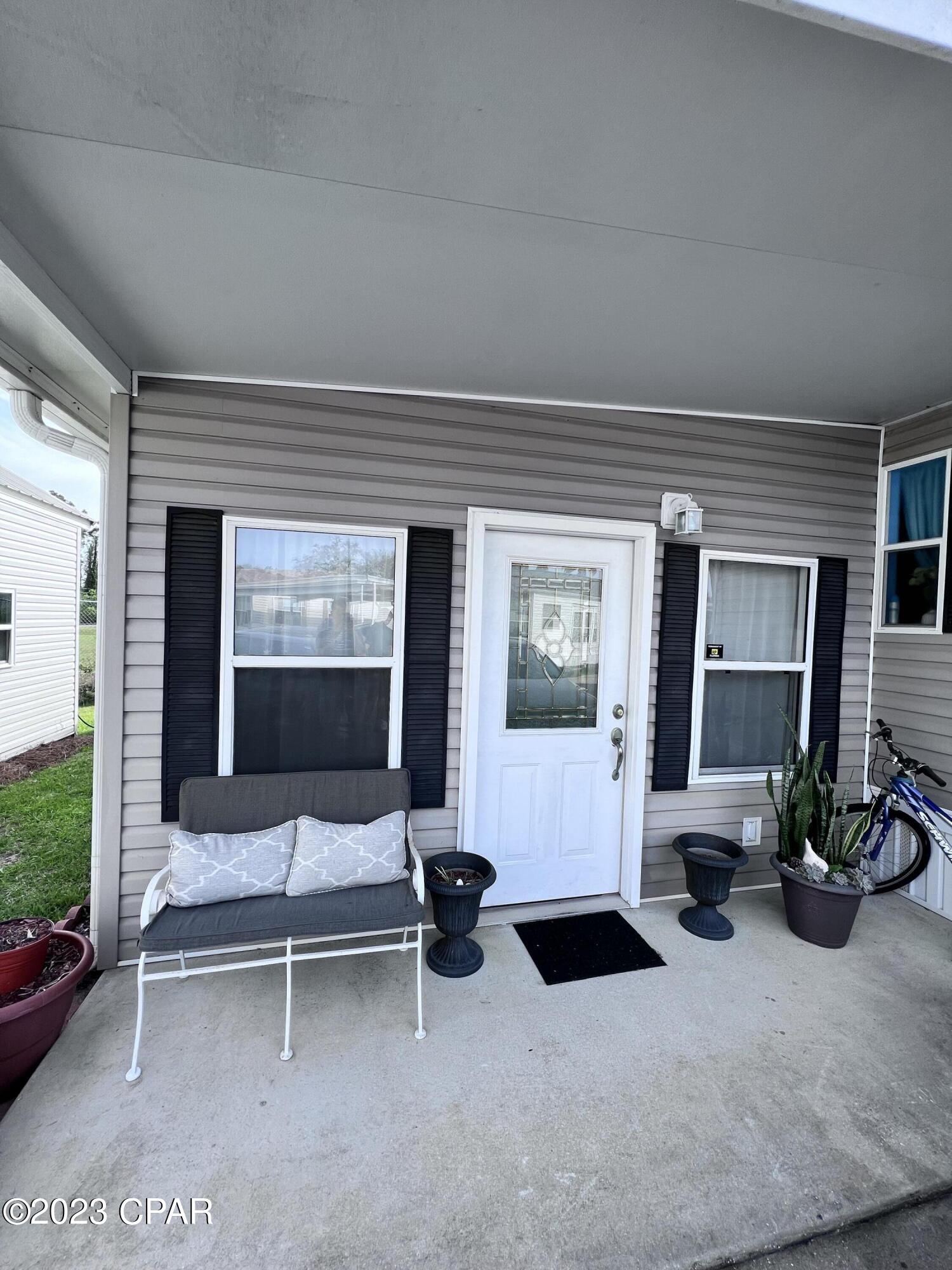 Fully Furnished home in a great location. This is a move-in ready 2 bedroom 2 full bath home. It's located in a quiet, gated community of Emerald Pointe Resort. Cute and private back yard with a screened-in porch where you can enjoy the evenings. The community has 2 pools, exercise room and a club house. A short 5 min drive to the beach. The rent includes water and trash. One pet up to 25lb will be considered.