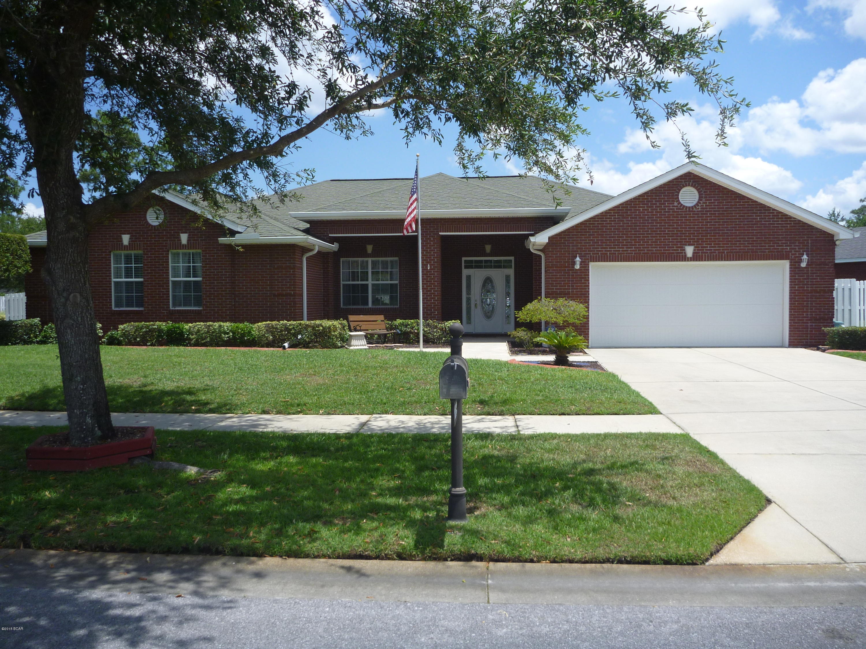 Pristine, all brick executive home in a great neighborhood! Beautiful landscaping and nicely appointed décor, you know you are in for a treat! Stepping in the home, it is light and bright with 12 ft ceilings, with crown molding, that add to the openness and French doors leading to the screened porch that also bring light into the living room and formal dining area. New carpet throughout! Moving into the kit you will find new cabinets and gorgeous granite countertops and lots of space for food prep. There is a breakfast bar that also provides a great serving area for parties. The breakfast nook sits in a bay window and there is access thru French doors to the screened porch. The kit and breakfast nook are open to a big family room, complete with gas log fireplace! A split floor plan, you will find 3 bedrooms on this same side of the home and 2 full bathrooms. Lots of storage in the large closets and linen closet. The MBR is HUGE! You won't have trouble placing your furniture there! The large MBA has his and her walk-in closets, cultured marble dbl vanity with knee space, sep tiled shower and let Calgon take you away in the deep garden tub! The backyard is enormous! Plenty of room for a pool! The garage is oversized with a laundry sink, workspace w/cabinets and counter and cabinets above that enclose 16' of pegboard storage. Floored attic adds storage. AND, if a hurricane is imminent, there are wood panels for the windows AND a gas generator (5500) that will keep your A/C and lights on, even if everyone else is in the dark! Be sure to put this on your MUST SEE list!