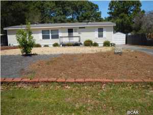 POSSIBLE OWNER FINANCING! This is a well maintained home on an attractive lot. The lot is large and on a cul de sac. The area is quiet and pleasant. The large lot has a fenced-in back yard with plenty of trees. The metal roof, upper end windows, and high density insulation help you keep cool. Carpet was replaced in the last year. The inside of the home looks like new. AC is electric. Heat is propane gas. Please see for yourself!