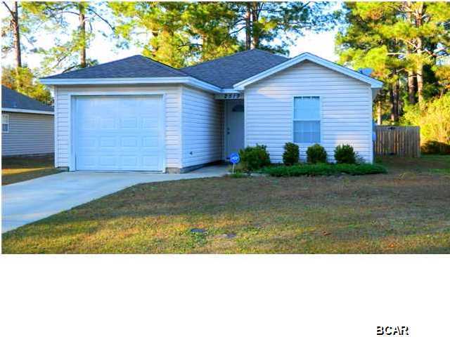 For rent. This newer home is centrally located in the heart of Panama City near Tyndall Air Force Base, shopping, and entertainment. This property has a one-car garage, and rear patio with fenced back yard. The home also features a split floor plan with the master bedroom on the back side of home. The kitchen offers a breakfast bar that opens up into the dining and living area. It has a very large, open feel in the living area with vaulted ceilings. There is a Washer/Dryer Hookup. Unfurnished. Tenant pays all utilities. ** Pets Considered with non-refundable pet fee of $250 **