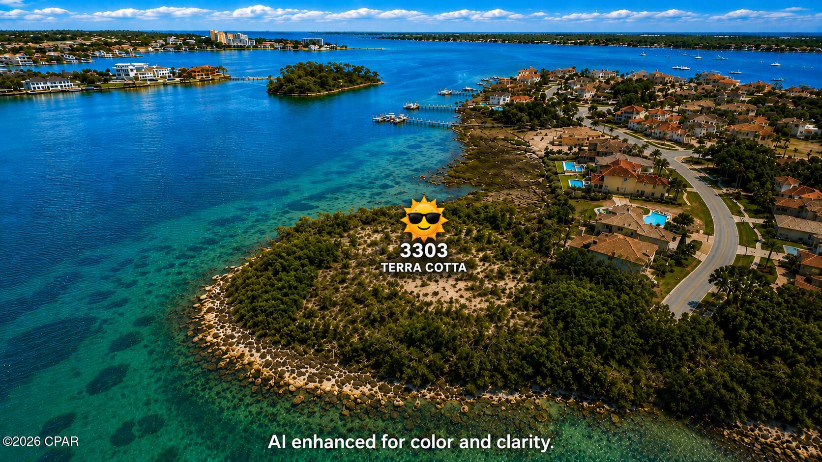 Welcome to an extraordinary opportunity inside the prestigious gated waterfront community of Finnisterre -- one of Bay County's most exclusive luxury neighborhoods. Situated along the sparkling waters of St. Andrews Bay, this rare waterfront homesite at 3303 Terra Cotta offers a breathtaking setting to build a true coastal masterpiece.

Surrounded by elegant custom homes, lush tropical landscaping, and winding private streets, Finnisterre is renowned for its upscale atmosphere, stunning architecture, and unmatched waterfront lifestyle. Residents enjoy beautifully maintained common areas, a private and peaceful setting, and a sense of luxury that is immediately felt the moment you enter the neighborhood.

These exceptional lots feature expansive water views and a unique peninsula-style setting that creates an incredible sense of privacy and exclusivity. Boaters will appreciate the prime location just minutes from the Pass, providing quick and convenient access from St. Andrews Bay directly to the Gulf of America for world-class fishing, boating, waterfront dining, and endless days on the water.

Whether you envision a luxury coastal estate with panoramic bay views, a private retreat surrounded by nature, or the ultimate entertaining property, this homesite offers a rare combination of beauty, location, and lifestyle that is becoming increasingly difficult to find along the Emerald Coast.

Enjoy the perfect blend of tranquility and convenience while remaining close to premier marinas, golf courses, shopping, dining, and the white sand beaches that make Northwest Florida famous.

Luxury waterfront opportunities like this in Finnisterre are exceptionally rare.