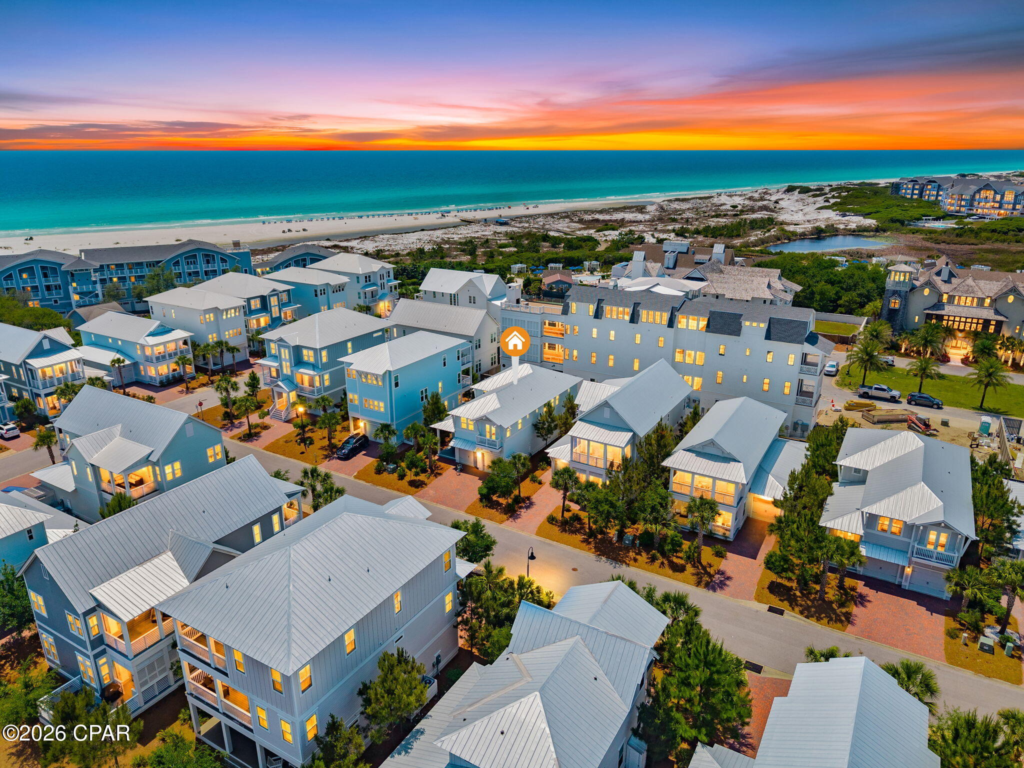 New pricing and positioned as a secondary vacation home in the private south side of Prominence. Ideal for securing a Watersound Beach Club membership as the back gate is a short stroll away. Short-term rentals allowed with a rental potential of $130,000 gross annual income. 

Designer inspired Maui plan with curated finishes: Serena and Lilly furnishings which all convey; shiplap throughout, designer chosen wallpaper makes each room a delight and tells a story. 

Step through the foyer into the private dining area enhanced by custom fixtures. The open floor plan offers a large entertainment space in the expansive living room. Step outside into your inspired green space oasis with multiple seating areas fire pit, and option for a gas grill station. Designer inspired Maui plan with curated finishes: Serena and Lilly furnishings which all convey; shiplap throughout, designer chosen wallpaper makes each room a delight and tells a story. Positioned as a secondary vacation home in the private south side of Prominence. Ideal for securing a Watersound Beach Club membership as the back gate is a short stroll away. Short-term rentals allowed with a rental potential of $130,000 gross annual income. Step through the foyer into the private dining area enhanced by custom fixtures. The open floor plan offers a large entertainment space in the expansive living room. Step outside into your inspired green space oasis with multiple seating areas fire pit, and option for a gas grill station.

The kitchen is a chef's dream with stainless steel appliances, expansive cabinetry, quartz counters, large pantry, custom window treatments, hardwood coastal flooring, and an oversized breakfast bar that opens up into the living and dining area. This floor plan features four bedrooms, two covered balconies, and three baths on the second floor. The bunk room sleep four and the primary is oversized with a massive walk-in closet, expansive ensuite bath with glass shower, dual vanities, and an outdoor balcony.

Other features throughout include: 12ft ceilings, 8ft doors, professional designed lighting and furnishings, hurricane impact windows and a tankless hot water heater.

The Town of Prominence is located on 30A between Seagrove and Alys Beach. Residents will enjoy access to a beautiful Town Center, Resort style pools.

There is an ease and convenience of walking over to ''The Big Chill'', the community's town center which includes restaurants, shops, an amphitheater with covered event pavilion, a cinema screen for movies, as well as a stage for concerts and events. The public beach access point is Deer Lake State.

The Watersound Beach Club is a private club with membership opportunities. There is a back gate on the South side of Prominence accessing the club.
Amenities include: Private Beach with Complimentary Beach Set-ups Two Zero-Entry Pools, Lazy River, Two Bars and Dining Venues, Towel Service and Changing Room with Lockers, Basketball Court, and Children's Activity Room & Arcade.