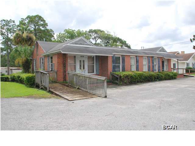 Large all-brick building with great traffic exposure on Harrison Avenue. The building sits on a large 100x193 lot with parking in front and behind the building. There are two separate entrances. Convenient to downtown, Hwy. 231 and Hwy. 98. Interior needs remodeling but all brick exterior, location and size offer lots of commercial potential.
