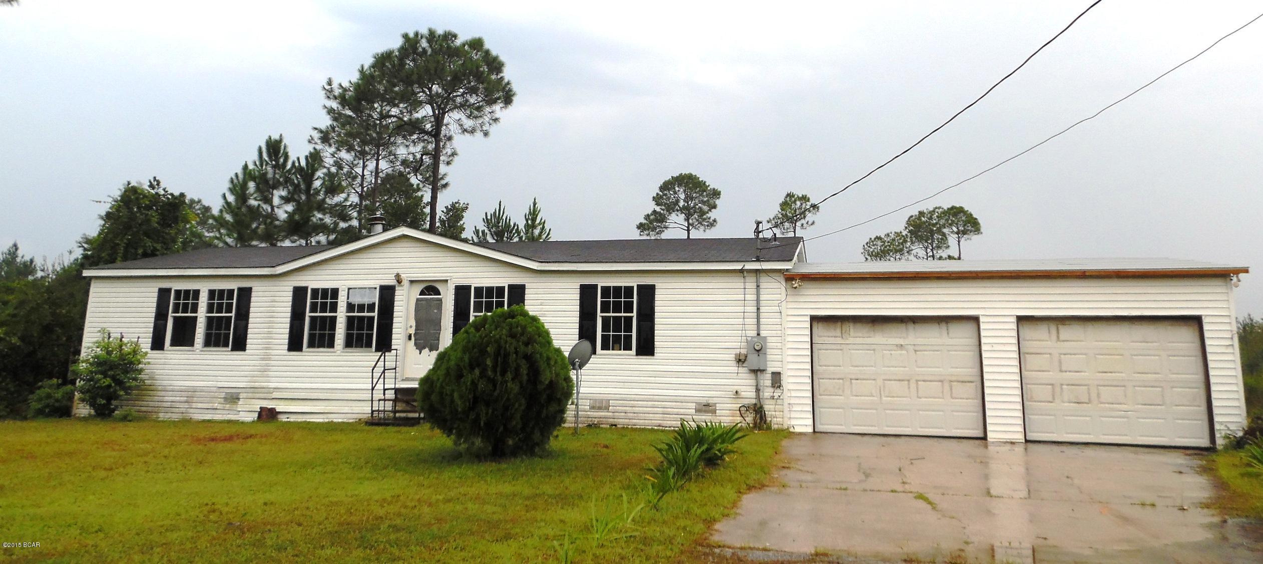Here's a great opportunity to own your own home, in a private area on the East side of Bay County, away from the hustle and bustle of the city.  This home boasts 3 bedrooms, 2 baths, fireplace and an oversized 2 car garage.  There's plenty of room for boats, bikes or pool, as this home sits on over 2 acres of land.  Located less than 15 minutes from Tyndall AFB, in an area of similar large, home lots.