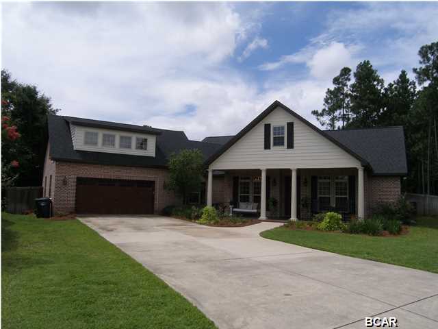 The Best Hawk's Landing has to Offer! Unbelievable Home with Mother-In-Law Suite! Beautiful, Executive Home in Desirable Hawks Landing. Split bedroom, open floor plan with a bonus room upstairs perfect for a media room or office. Master bath has separate shower, garden tub, water closet, walk-in closet and double vanities. Hardwood floors, granite countertops, fireplace, stainless appliances, crown molding, built-ins in living room, wood blinds and much more. Large, private, landscaped yard with sprinkler system, fire pit - room enough to add a pool. Back porch is covered, painted concrete flooring and ceiling fans. Separate mother-in-law suite has private entrance, handicapped shower and basic kitchen. Perfect apartment setting for parents, in laws or guest quarters. This home must