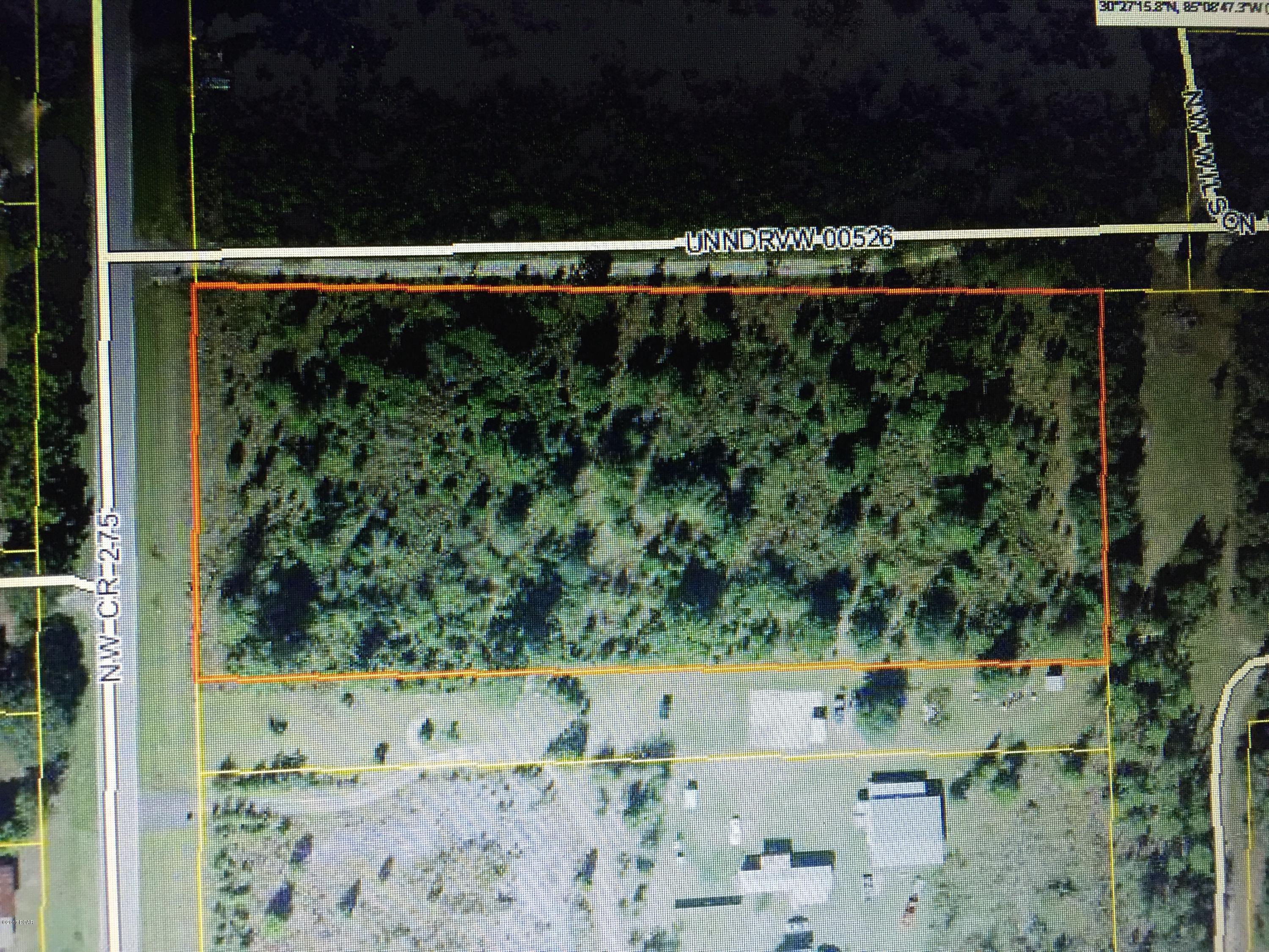 BEAUTIFUL HOMESITE IN THE COUNTRY!PAVED ROAD FRONTAGE AND READY FOR YOUR DREAM HOME! PEACE AND QUIET1 BRING ALL OFFERS!