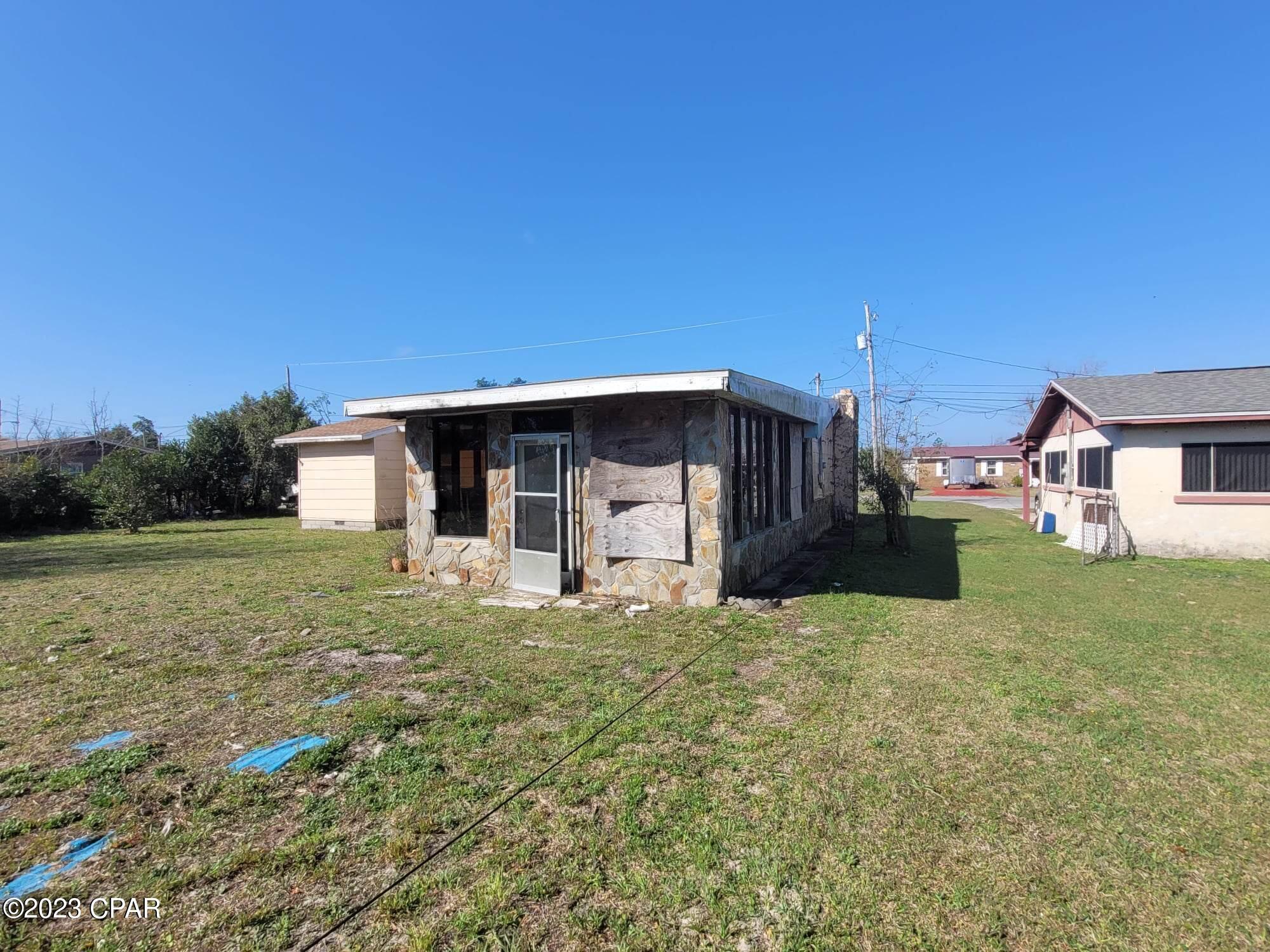 Here is a GREAT opportunity to own a home in Callaway!! Located minutes to all Panama City Florida has to offer or just minutes to Tyndall Air Force base!  This 3 bedroom 2 bath home can be made into the perfect home! There is a living room, Family room with a stone fireplace and an additional den, so space is not an issue here!! Nice interior cleared lot with plenty of room for the kids to play in the yard!! This home will NOT last long at this price so call today for your personal showing!!!