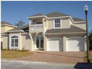 The beautiful four bedroom house has many upgrades including custom cabinets, tile throughout, hardwood floors on stairway and hall, mirrored closet doors. Master bath has garden tub, separate shower and double vanities. Screened pool can be accessed from master bedroom. Back of lot is wooded which provides privacy. Pool service and lawn care are included. Age, sq. ft. and all measurements are approximate.