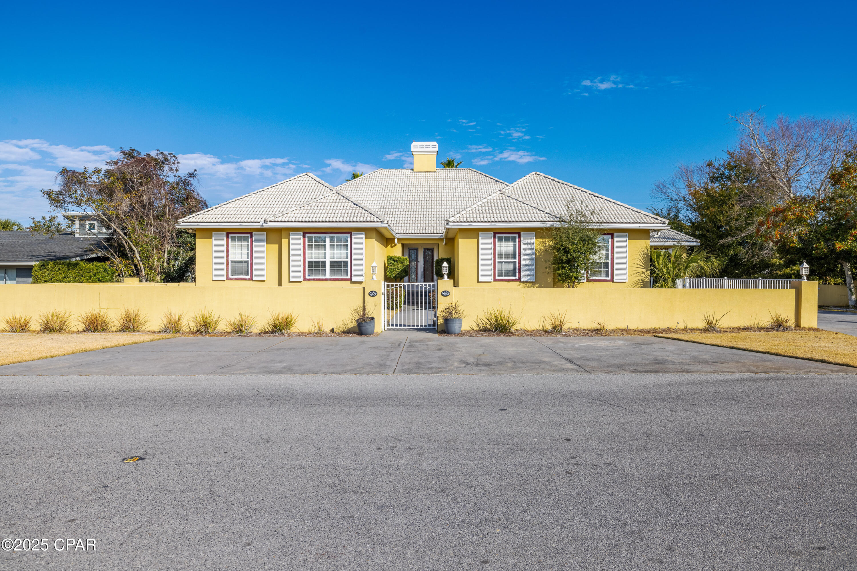 Amazing waterfront opportunity in the desirable gated Bay Point community! A boater's dream, this home sits on a deep canal  with a 124-ft dock! It features three separate living quarters. The main house  has a split floor plan ,it features an open-concept living, dining, and kitchen area with stunning views of the pool and canal. Ideal for multi-generational living, there is a separate mother-in-law suite complete with a laundry room, nice size kitchen, living space and pool access. Additionally, a canal-level studio apartment with a kitchen and full bath is perfect for a captain, guest, or teenager. Situated on an oversized lot, this property is ideal for waterfront living!SELLER IS IN PROCESS OF REPLACING THE SEAWALL.
