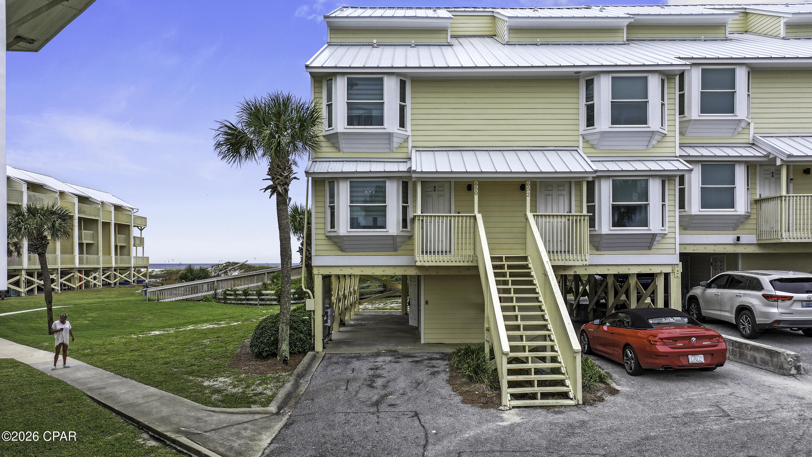 SUNSETS & SEASHELLS AWAIT!! Experience the best of Gulf-front living in this beautifully updated 3BR/3BA end-unit townhome nestled within the gated Sea Cliffs community on the highly desirable North Cape San Blas. Offering additional privacy, extra natural light, and breathtaking panoramic Gulf views, this coastal retreat places you just steps from the sugar-white sand and emerald waters of Florida's Forgotten Coast. The open-concept living area is designed for effortless entertaining with luxury vinyl plank flooring, a stylish kitchen featuring granite countertops, stainless steel appliances, a breakfast bar, and seamless access to a spacious Gulf-front balcony where spectacular sunsets become part of your everyday routine. Upstairs, two comfortable guest bedrooms share a convenient Jack & Jill bath, including a waterfront bedroom with its own private sundeck and a second bedroom offering a peek of St. Joseph Bay. The top-floor primary suite is a peaceful escape featuring a walk-in closet, double vanity, beautifully tiled walk-in shower, and a private balcony perfect for enjoying sunrise skies and refreshing coastal breezes. Offered fully furnished and completely rental-ready, this proven income-producing property includes quality furnishings, cookware, a Keurig, air fryer, and everything needed to welcome guests from day one. The ground level provides covered parking, generous storage, and an outdoor shower for rinsing off after long days on the beach. Sea Cliffs continues to impress with a recently upgraded beach boardwalk complete with a convenient ramp for beach carts, a resurfaced community pool, and a new playground, creating an ideal setting for families, vacationers, and owners alike. Whether you're searching for a primary residence, vacation getaway, or exceptional investment property, this rare Gulf-front end unit delivers the coastal lifestyle you've been dreaming of. Call for your private tour & LIVE THE BEACH LIFE!