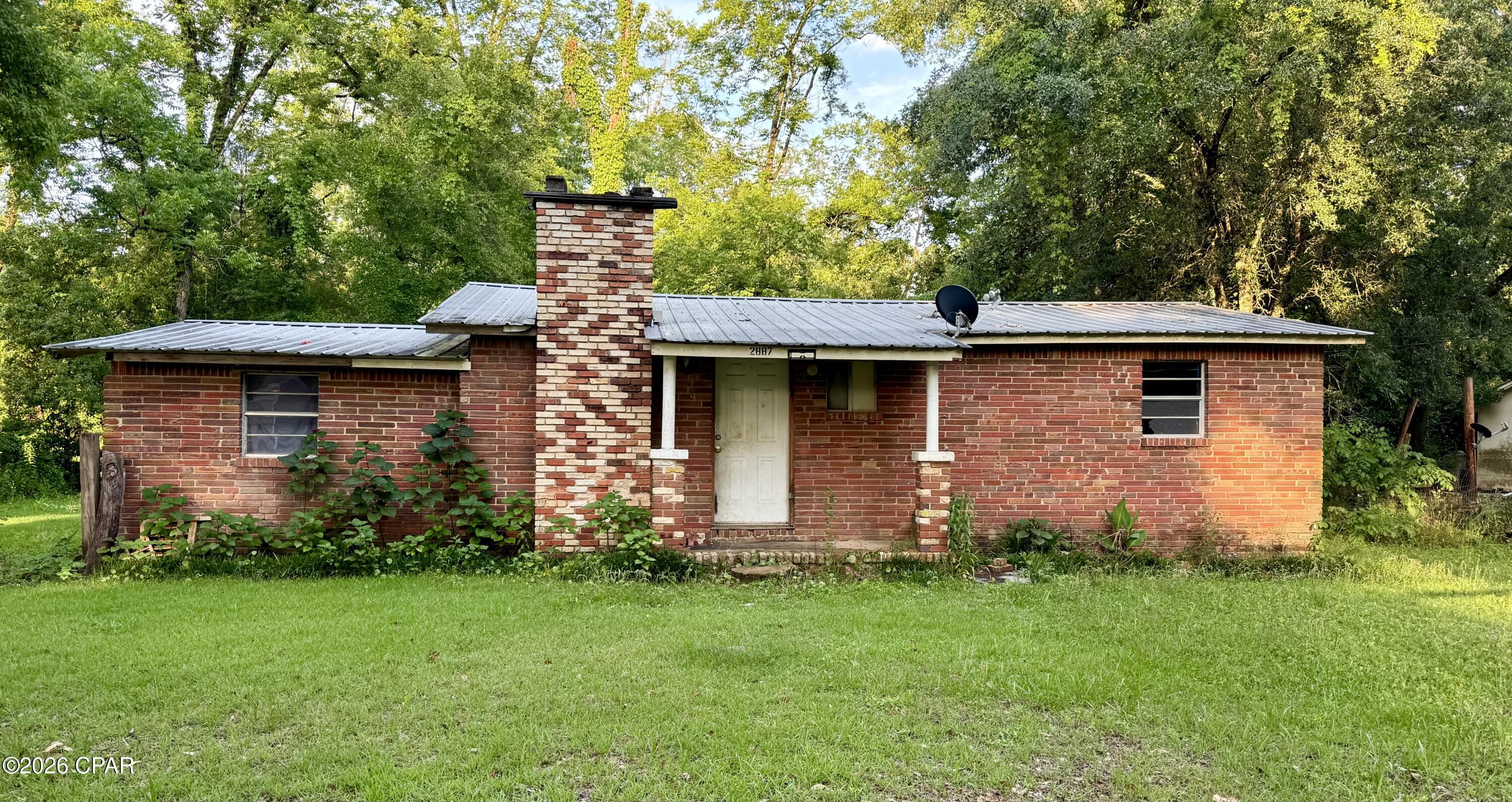 Opportunity awaits with this investor special in Vernon, FL! This solid brick 3-bedroom, 1-bath home sits on a spacious lot and offers great potential for a renovation project, rental investment, or starter home makeover. With good bones and a desirable location, this property is ready for someone to bring their vision to life.

Conveniently located just minutes from Holmes Creek and Cypress Springs, you'll enjoy easy access to some of the area's most beautiful natural attractions, along with several nearby lakes for fishing, boating, and outdoor recreation. Plus, Panama City Beach is only approximately 37 minutes away, giving you the perfect balance of small-town living and coastal convenience.

Don't miss this chance to invest in a property with potential and location appeal. Contact your favorite agent today to schedule a showing! Buyer/Buyer's agent to verify all measurements, dimensions, and any other pertinent information regarding the property.