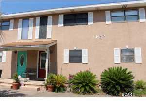 No Condominium fee - No Association Fee!!! Enjoy a short stroll to the beach. Property has been well maintained and owner occupied. Unit contains two bedrooms, 1.5 baths, living room, dining area, kitchen, nice finishes, crown moulding, built in bookcases, well maintained. Located in the well established area of Open Sands subdivision, Panama City Beach. This unit would make a great rental investment or keep as your own private getaway! Convenient to Gulf of Mexico, Pier Park, restaurants, golf courses and additional recreation. Townhome is being sold ''As-Is''. Possible Owner Financing!