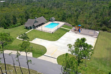 Welcome to Cedar Creek at Deerpoint Lake. This community is tucked away in a natural setting boasting the large pavilion for picnics or parties, an outdoor catering kitchen and a large pool next to the playground with updated play equipment. There is a nicely decorated clubhouse for your private gatherings, events or roasting marshmallows over the open fire pit out back. Interior lots start at $67500 creek front lots start at $149,500. Bring your own builder or ask for information on some of the creative builders who have already built in the community. Don't forget to check out the pool house and the beautiful creek house- phase 1 lot 4
