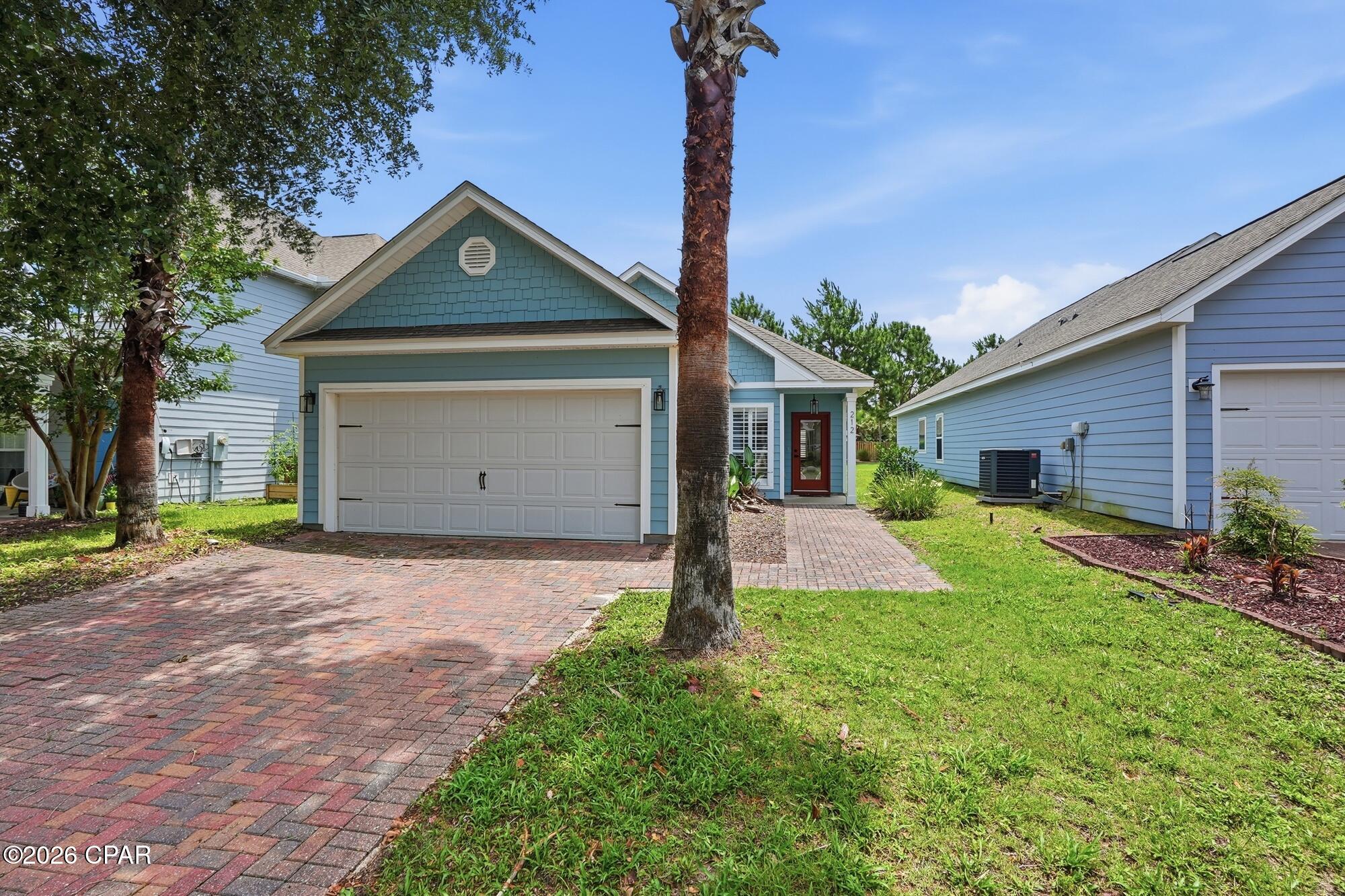 Welcome to 212 Turtle Cove in Panama City Beach, where coastal luxury, modern design, and effortless living come together in one incredible turnkey property. Completely renovated in 2025, this stunning 3-bedroom, 2-bath villa has been thoughtfully redesigned with high-end finishes and upscale details throughout.

Step inside to a light-filled interior featuring luxury vinyl plank flooring throughout with absolutely no carpet, plantation shutters in every room, designer lighting, and beautifully selected quartz and quartzite countertops that elevate the entire space. Every inch of this home was designed with both style and comfort in mind, creating a sophisticated yet relaxed coastal feel perfect for full-time living, a second home, or investment property.

Located in the highly sought-after Turtle Cove at Lake Powell community, residents enjoy an unmatched lifestyle surrounded by nature, recreation, and convenience. Lake Powell, Florida's largest coastal dune lake spanning nearly 800 acres with direct connection to the Gulf of Mexico, is right at your fingertips. Spend your days kayaking, paddleboarding, boating, or simply enjoying the peaceful waterfront setting.

Community amenities are truly resort-style and include a private dock, pool, hot tub, fitness center, clubhouse with gathering space and catering kitchen, plus basketball, tennis, and pickleball courts. And when you are ready for the beach, the sugar-white sands of the Gulf are just minutes away along with Inlet Beach, Scenic 30A, and Pier Park for dining, shopping, and entertainment.

Properties this updated, this amenity-rich, and this close to everything rarely come available. Don't live under a shell. Experience the best of beachside living at Turtle Cove.