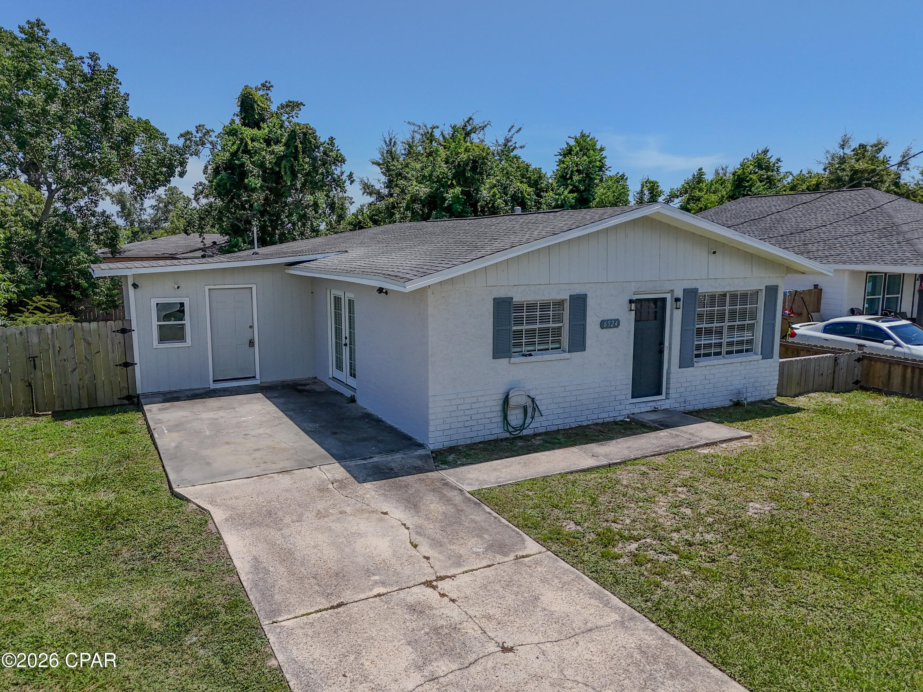 Welcome to 6524 Olokee Street, a charming and move-in-ready home offering comfort, convenience, and value in the heart of Panama City. This 3 bedroom, 2 bath home features an inviting open concept layout that seamlessly connects the living, dining, and kitchen areas, creating the perfect space for everyday living and entertaining.

Step outside to enjoy the large backyard and patio area that is ideal for grilling, relaxing, or hosting gatherings with friends and family.

Conveniently located near Tyndall Air Force Base, shopping, dining, schools, and outdoor recreation, this property offers easy access to all that Panama City has to offer. Whether you're a first time homebuyer, military family, investor, or someone looking to downsize, this home presents an excellent opportunity to own an affordable property in a growing area.

Don't miss your chance to make 6524 Olokee Street your new home.
all information assumed accurate if important buyer to verify