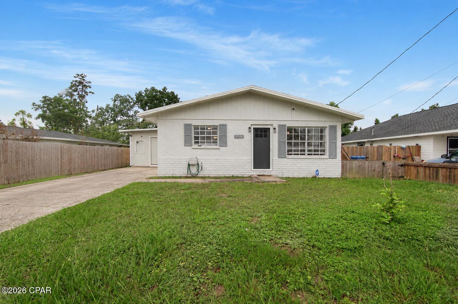 Welcome to 6524 Olokee Street, a charming and move-in-ready home offering comfort, convenience, and value in the heart of Panama City. This 3 bedroom, 2 bath home features an inviting open concept layout that seamlessly connects the living, dining, and kitchen areas, creating the perfect space for everyday living and entertaining.

Step outside to enjoy the large backyard and patio area that is ideal for grilling, relaxing, or hosting gatherings with friends and family.

Conveniently located near Tyndall Air Force Base, shopping, dining, schools, and outdoor recreation, this property offers easy access to all that Panama City has to offer. Whether you're a first time homebuyer, military family, investor, or someone looking to downsize, this home presents an excellent opportunity to own an affordable property in a growing area.

Don't miss your chance to make 6524 Olokee Street your new home.
all information assumed accurate if important buyer to verify