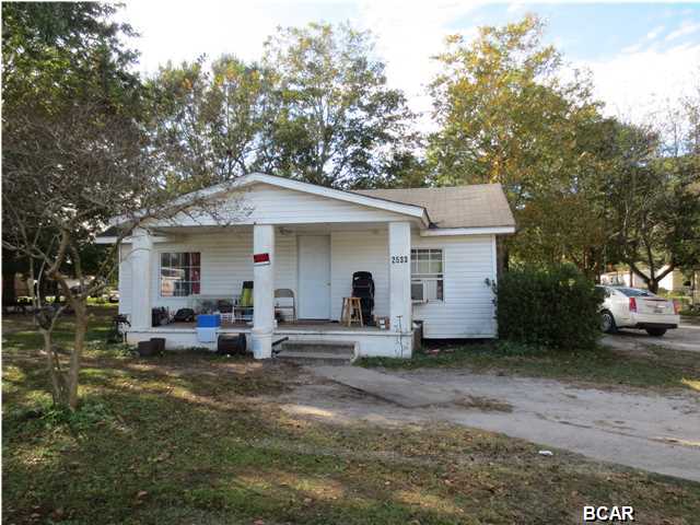 Great rental opportunity or first time home buyer. Home has refinished original hardwood floors throughout with vinyl in kitchen and bath. Plumbing and electrical updated 2011-2012, roof is approx. 10-12 years old. Lot will be split and will have new legal. City water is available, meter is in place, seller is in the process of having connected to city water currently on a well.