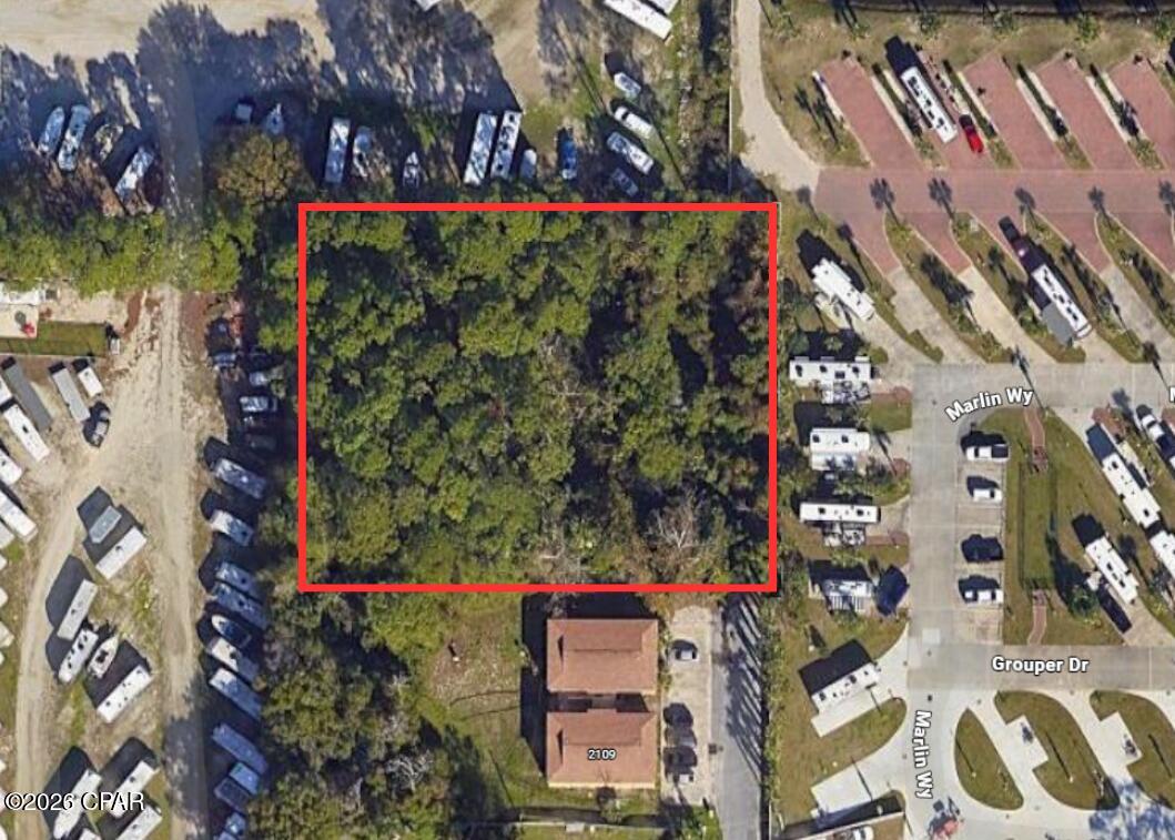 Rare opportunity to own approximately 0.85 acres in a highly desirable Panama City Beach location just minutes from the Gulf, shopping, dining, and entertainment. Tucked away on Hinson Ave near Front Beach Rd and Thomas Dr, this property offers a unique blend of privacy and convenience with easy access to everything the beach lifestyle has to offer.

Whether you're looking to build your dream home, a private coastal retreat, or hold as a future investment, this oversized parcel provides endless potential in one of the area's fastest-growing locations. Buyer to verify dimensions, zoning, land use, and utility availability.