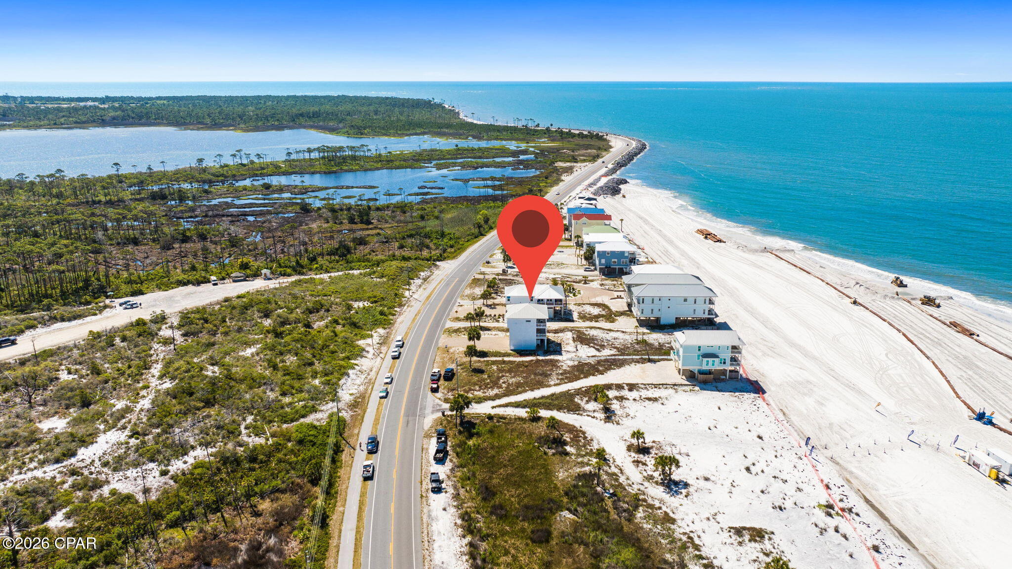 SALTWATER SERENITY LIVING!  Experience the magic of the Forgotten Coast from this exceptional beachfront retreat at 3625 Cape San Blas Rd, where sugar-white sand, emerald waters & unforgettable sunrises & sunsets become part of everyday life. Thoughtfully designed for coastal living, this stunning residence offers the perfect blend of elegance, comfort & investment potential. Expansive windows invite natural light to pour into the open living spaces while framing spectacular Gulf views from multiple levels. Spacious interiors are designed for gathering, featuring a beautifully appointed kitchen, generous living & dining areas, well-sized bedrooms & private outdoor spaces ideal for relaxing after a day on the beach via your deeded beach access. Whether you're searching for a full-time coastal escape, second home or income-producing vacation rental, this property delivers the lifestyle buyers dream about. Set along one of Florida's most treasured stretches of shoreline, this home places you moments from all the adventure Cape San Blas is known for--boating, fishing, kayaking, scalloping, miles of paved biking trails & exploring the natural beauty of nearby state park, consistently celebrated for its pristine beaches.  Spend your days shelling quiet beaches, paddleboarding on St. Joseph Bay, or cruising the Cape to local favorites. When you're ready for dining, shopping & entertainment, historic downtown Port St. Joe is just a short drive away with charming boutiques, marinas & waterfront restaurants. From sunrise coffee overlooking the Gulf to evenings filled with sea breezes & starry skies, every detail invites you to slow down & savor the coastal lifestyle. Rarely does a property combine location, views & timeless beach appeal so effortlessly. The Gulf Front lot is also available for purchase refer to MLS: 790093. This is more than a home--it's a front row seat to everything that makes Cape San Blas so special. Call for your private tour & LIVE THE BEACH LIFE!