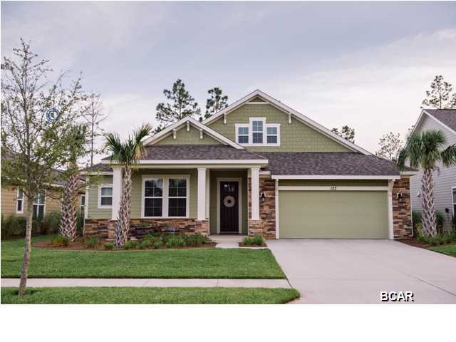 **LIKE NEW** Breakfast Point Gem on popular Cedar Hammock Lane! The popular Vermillion floor plan boasts a split bedroom layout with 4 bedrooms and 3 baths, highlighted by numerous wonderful upgrades. The main room, breakfast nook and kitchen are featured in one large open space highlighted by a large, fabulous island in the kitchen along with stainless appliances and a modern tile backsplash. Gorgeous wood floors, bead board, custom trim work, upgraded lighting and high ceilings add a nice feeling of warmth combined with luxury. The master suite is quite large and includes dual vanities, garden tub, separate shower and large walk-in closet, all highlighted by fantastic upgrades and finish work. The covered rear patio is roomy, overlooking a quaint, low-maintenance rear yard. This