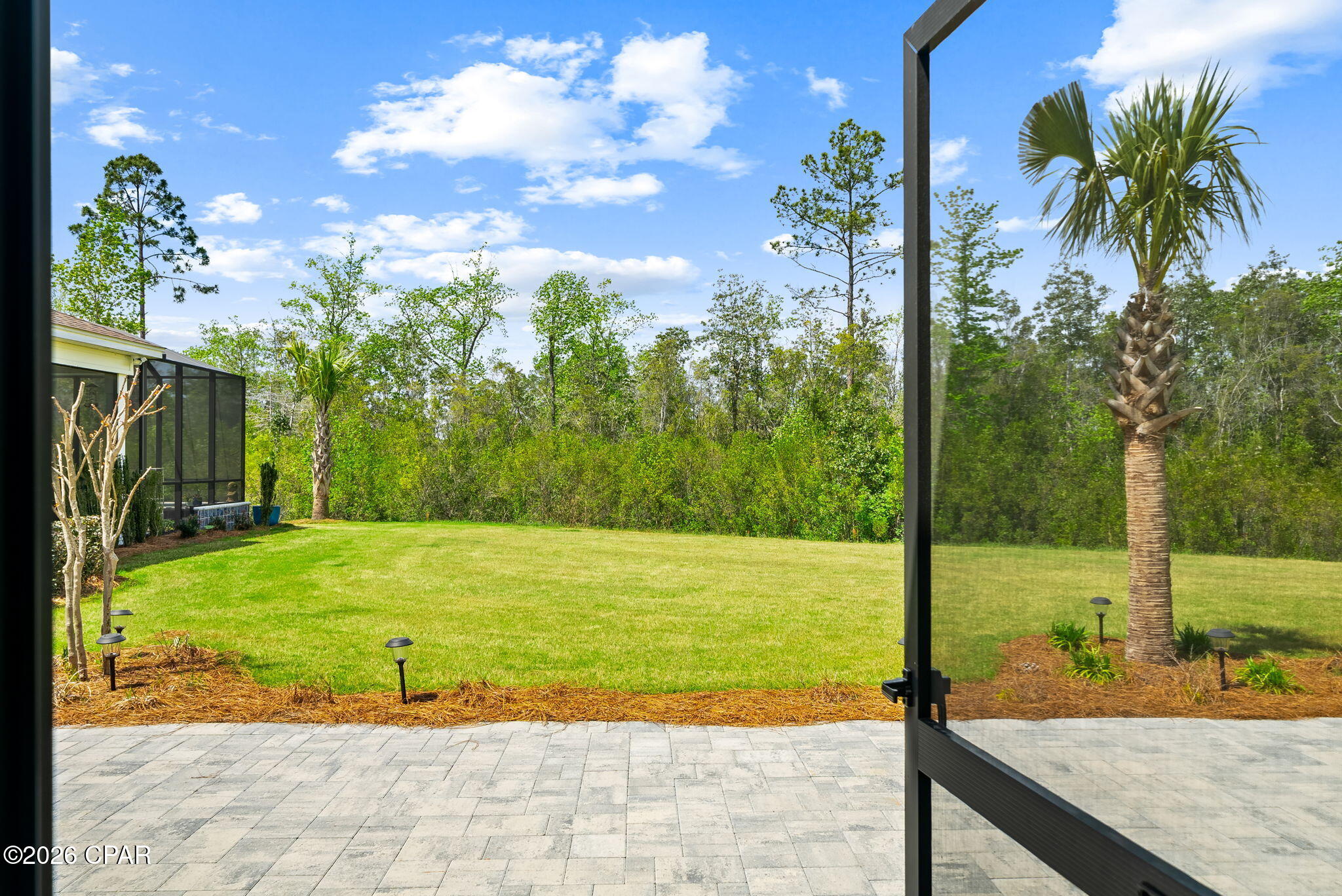 Now available fully furnished if buyer desires a turn-key home! Beautifully decorated Antigua Villa on a premium preserve homesite in fabulous phase 6BC in Latitude Margaritaville Watersound! This coastal decor oasis has a serene location adjacent to a quiet cul-de-sac surrounded by nature. Add a pool if you like and view the sunsets and trees from the oversized and private lot. From the living room, three glass slider doors give you access to the screened porch with epoxy flooring with an additional extended paver lanai for grilling and entertaining. Upon entry, you will be greeted by a vaulted, beamed ceiling, tropical wallpaper accented dining room and shiplap walls. Need a home office, extra bedroom or craft room? There is a dedicated den with designer barn door including book/magazine racks. Even more upgrades abound, including quartz counters, laminate flooring, under-cabinet and over-cabinet lighting, shower grab bars, and a whole-house water filtration system. Some furnishings are negotiable, so you can start enjoying the Latitude Margaritaville Watersound lifestyle quickly and easily. Community activities revolve around the vibrant Town Square, where neighbors gather to enjoy live music and fun activities arranged by the full time Lifestyle Director. A favorite amenity is the resort-style Paradise Pool, adjacent to the Intracoastal Waterway on one side and the Private Bar & Chill Restaurant and Overlook Bar on the other. Enjoy the numerous pickleball courts, state of the art fitness center, walking trails, tennis and basketball courts, cornhole and bocce, and a kayak launch! That's not all - enjoy a show at the Last Mango Theater, get creative at the Clayground Pottery Studio or Hangar Workshop woodworking studio, or give your pet the best day ever at Bargaritaville Dog Park and Barkaritaville Pet Spa. Our new shopping and dining complex, West Bay Center, is underway with Publix grocery store, Pizza by the Sea, nail salon, and doctor offices opening soon. More restaurants and shopping is coming, along with a brand new hospital being developed by Tallahassee Memorial Health and Florida State University. Come and live your best life at the only 55 and better community in NW Florida by the best beaches in the US!