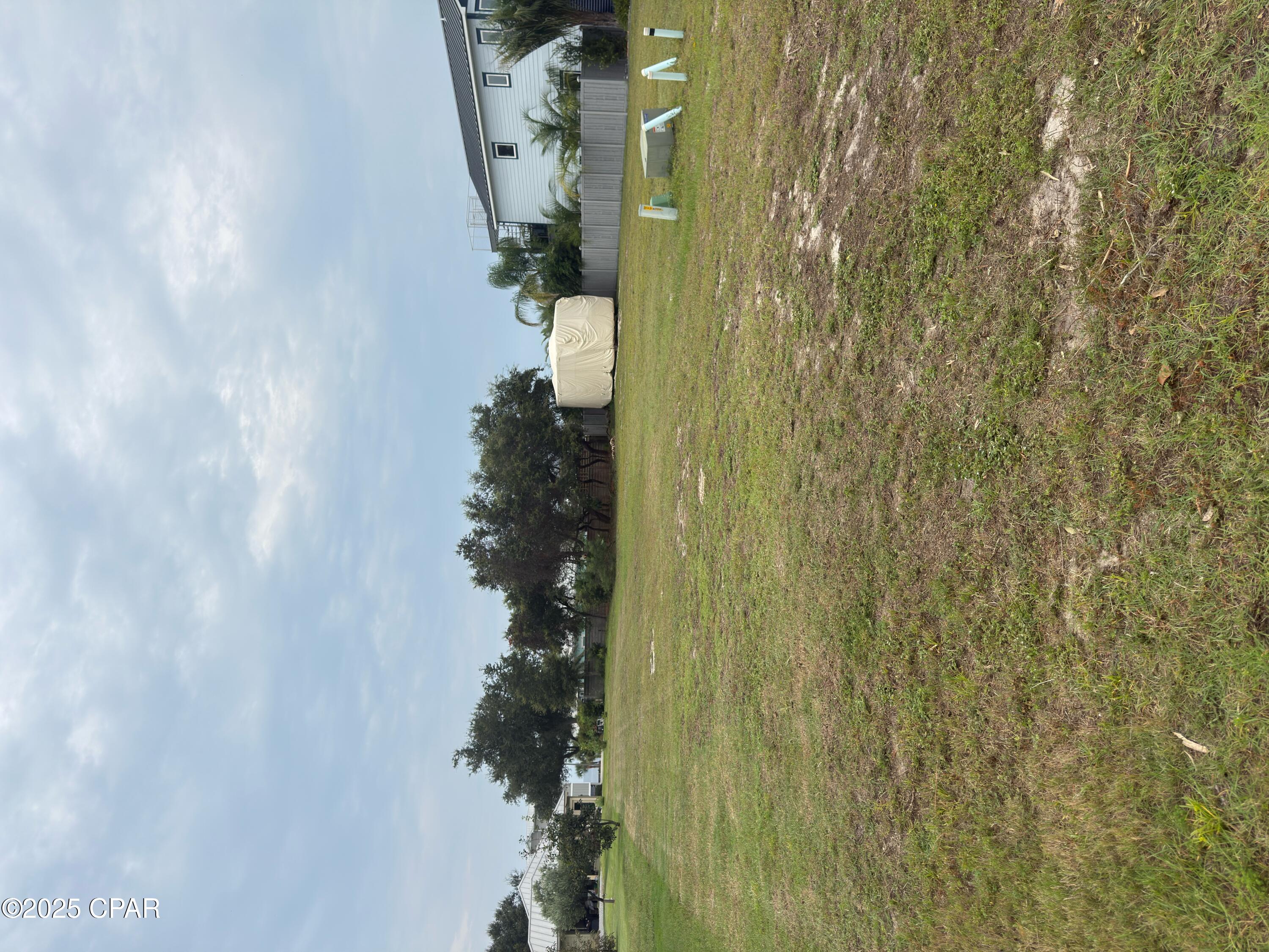 Cleared and platted building lot located on a quiet dead end street and located in an X flood zone for ground floor living options while near the beach! Less than 350' from Lightkeeper's county park that has walking trails, amphitheater, pickle ball courts, dog park, picnic facilities, boardwalk for Gulf of America access. Depending upon the height of the house plans, there may be some Gulf views available. Priced to sell. Some dimensions were obtained from the Gulf County Property Appraiser's office, please verify if important.